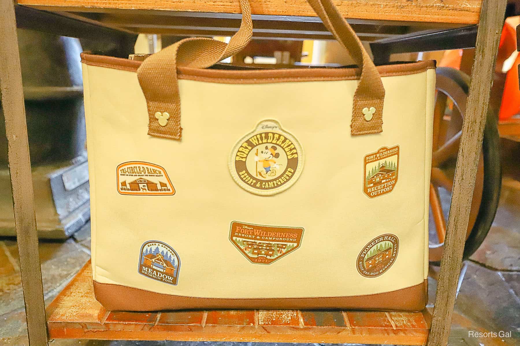 a tote back with Fort Wilderness badges