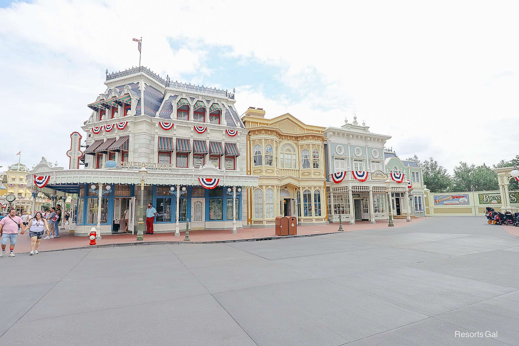 the corner of Main Street decorated for the 4th of July at Magic Kingdom 