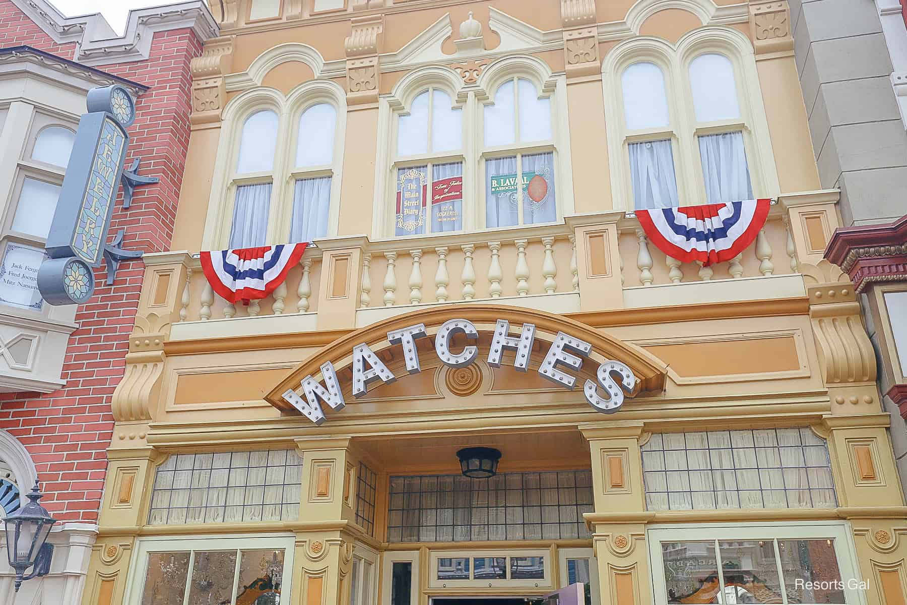 Patriotic bunting hung above the Watches sign 