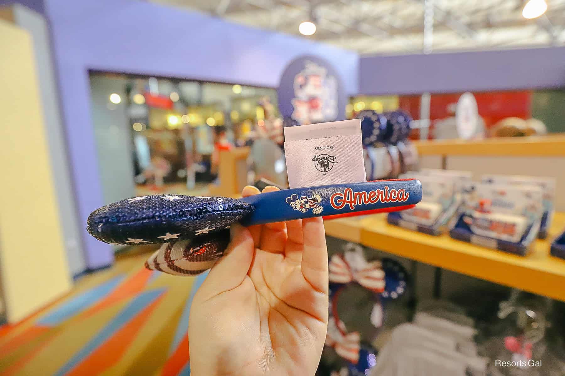 side of the ears has Mickey Mouse and says "America" 