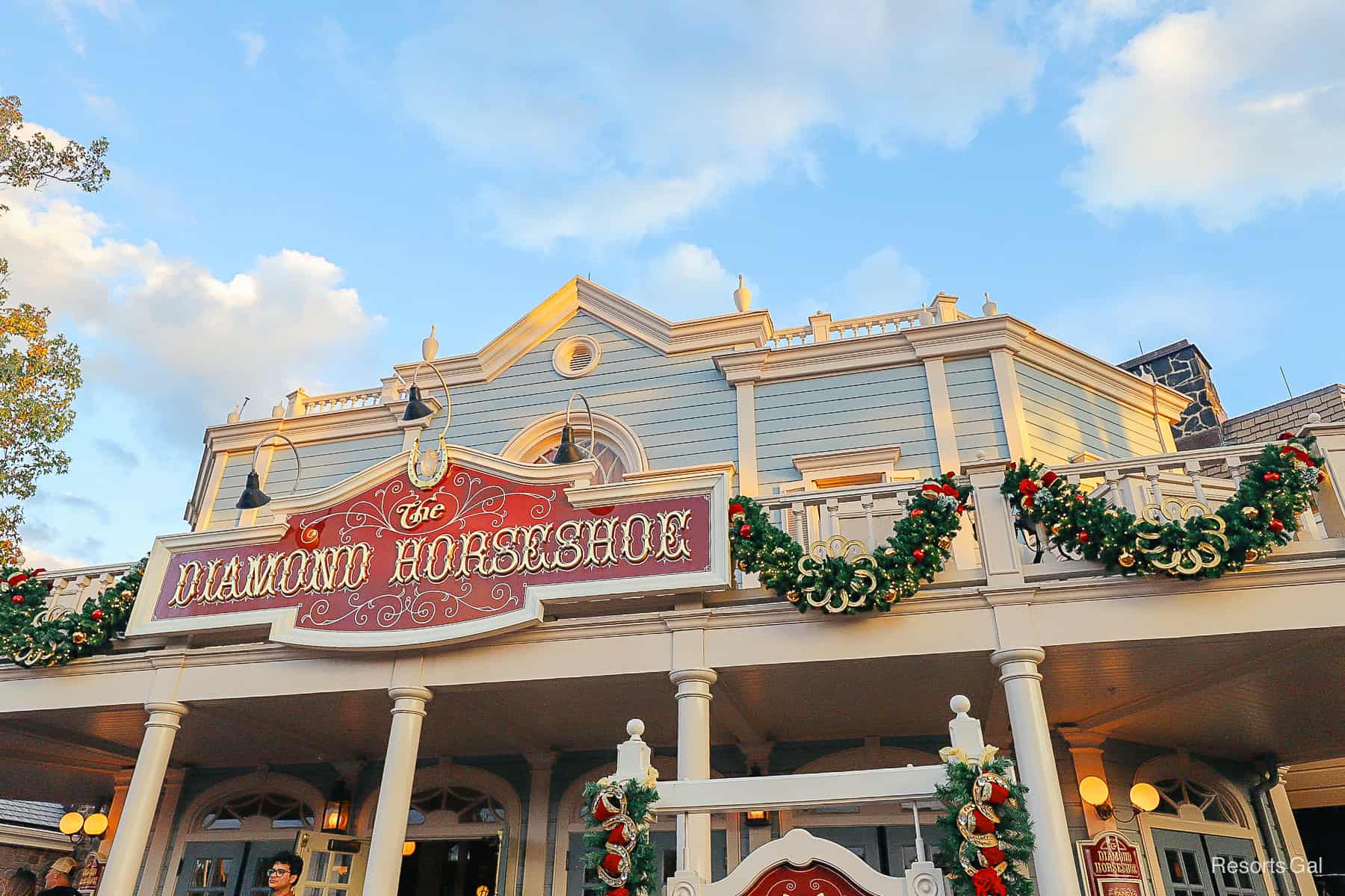 The Diamond Horseshoe at Magic Kingdom with holiday decorations 