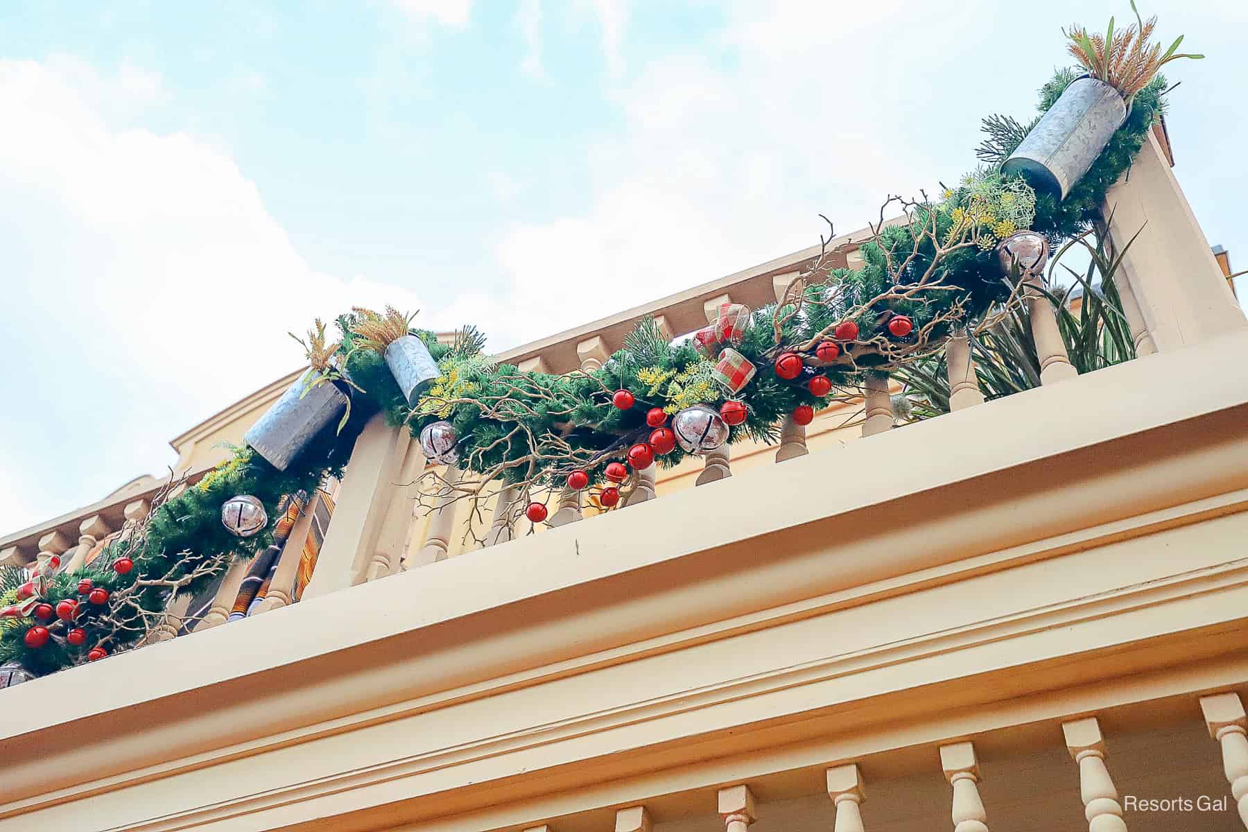 a closeup of the Frontierland garland featuring berries and tree stems 