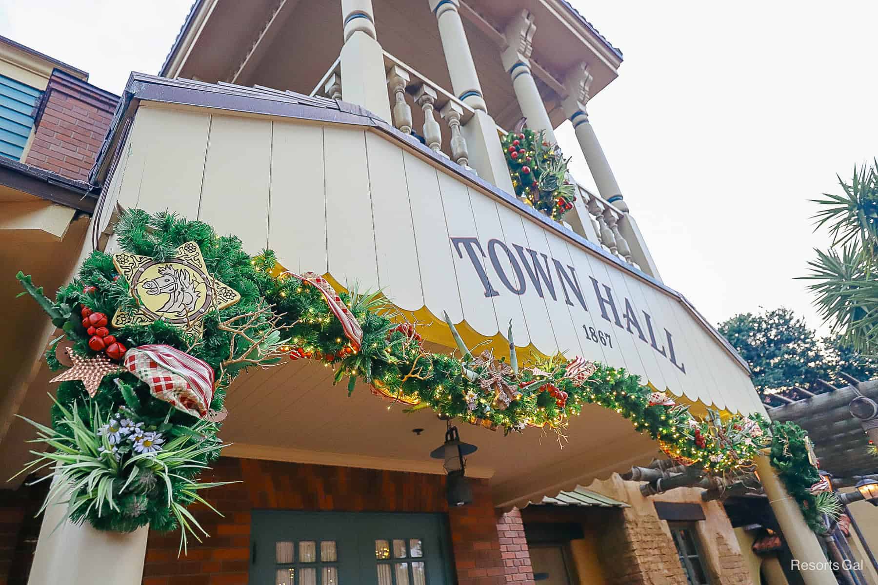 Town Hall of Frontierland Christmas decorations featuring horses and ribbons 