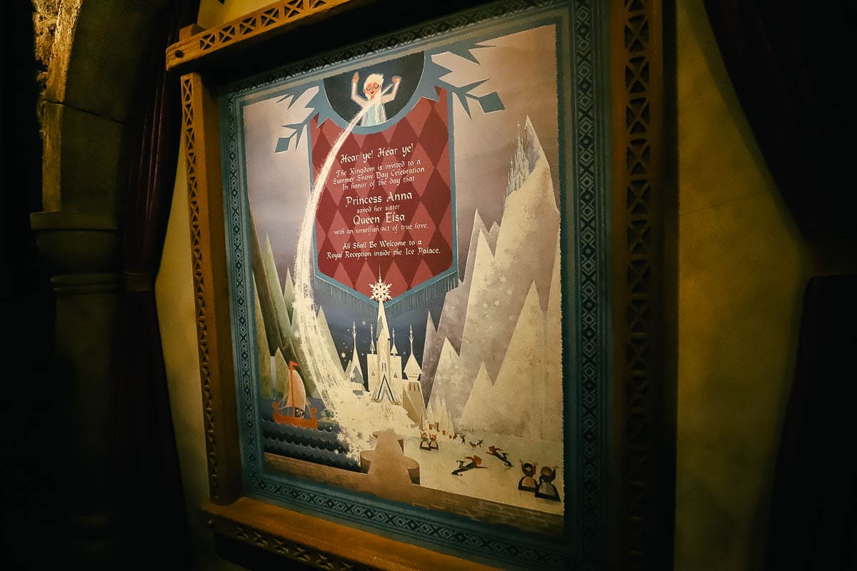 A sign in the queue of Frozen Ever After that tells how Anna saved her sister Elsa with an act of true love. 