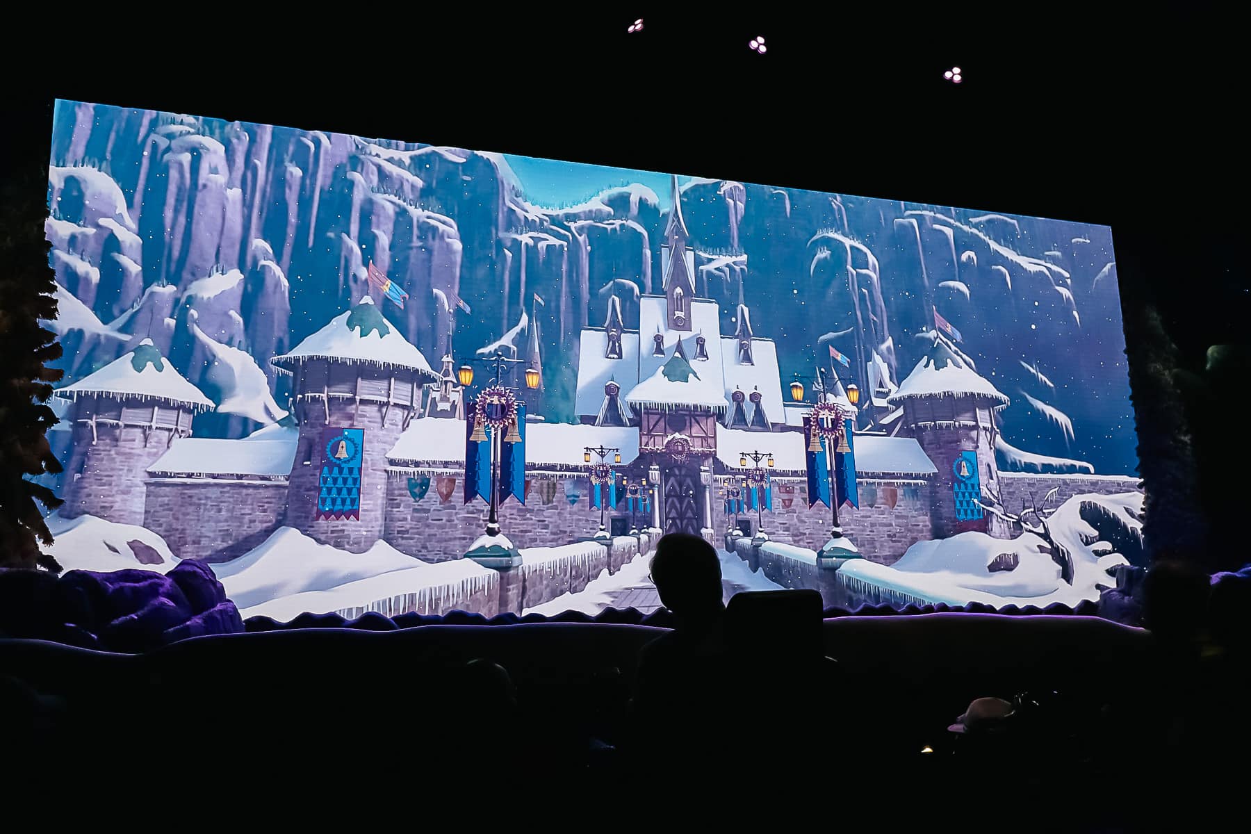 Arendelle on the screen as the show begins. 