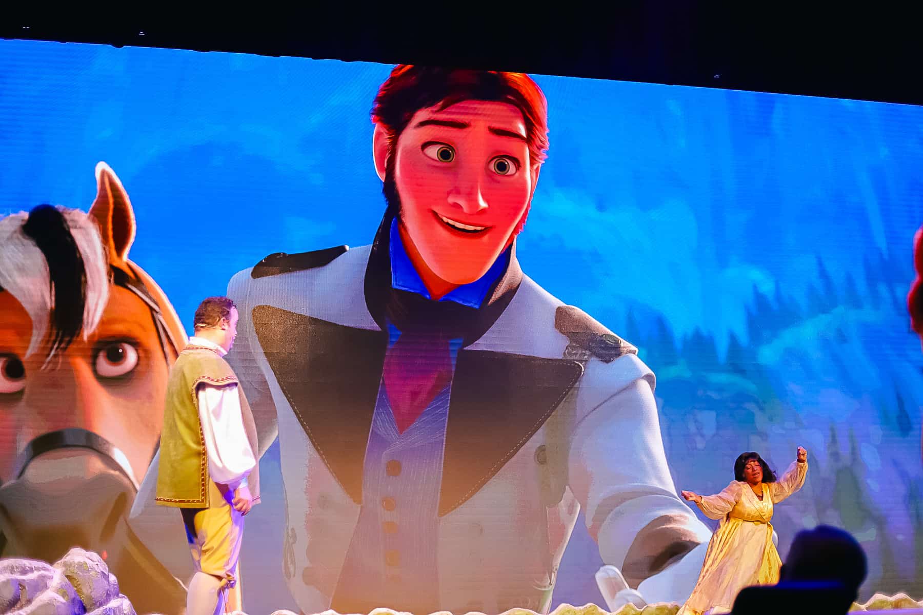 Hans on the screen while Aria dances. 