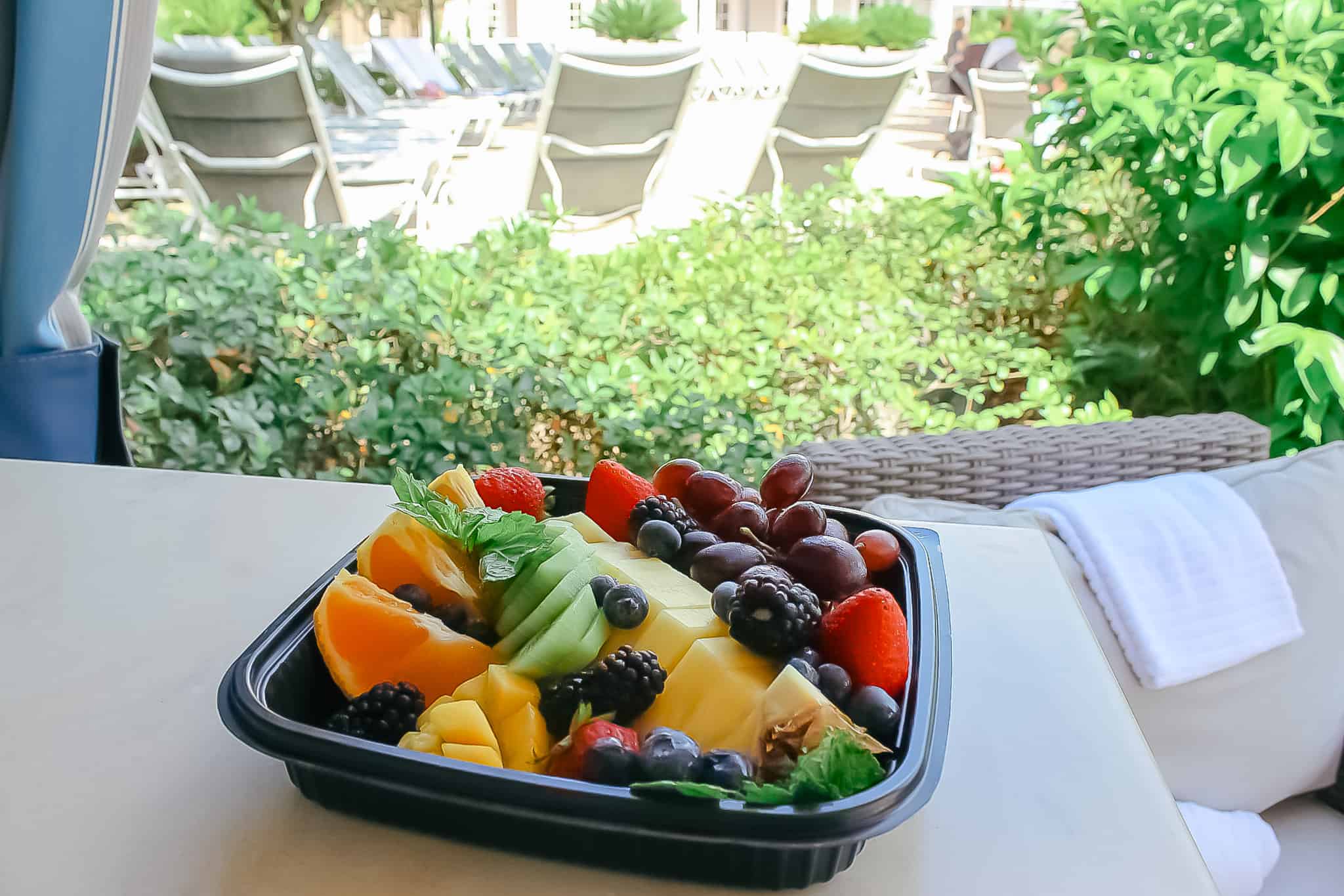 a fruit tray sitting on the counter 