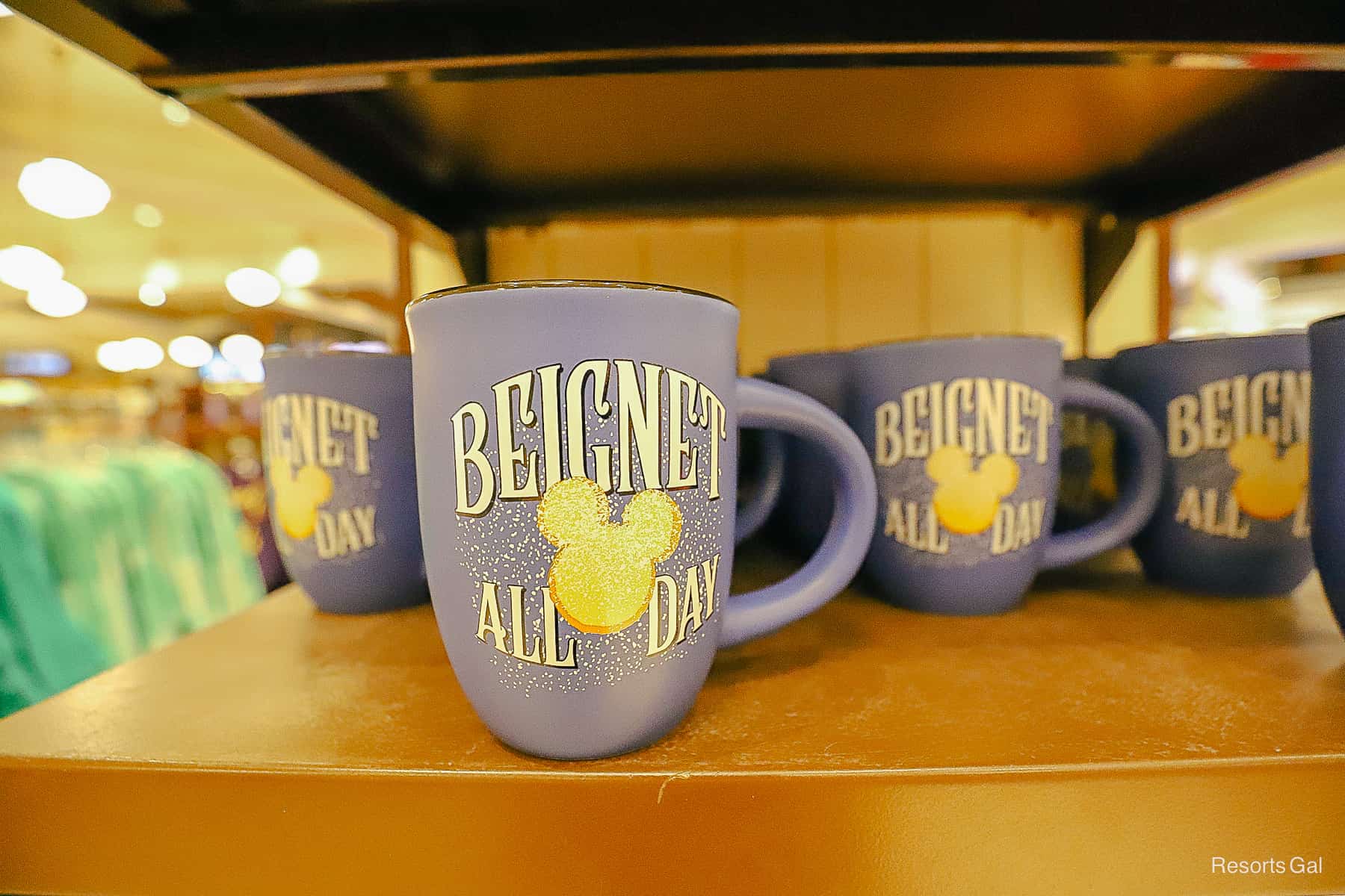 a mug in the gift shop that says Beignets All Day 