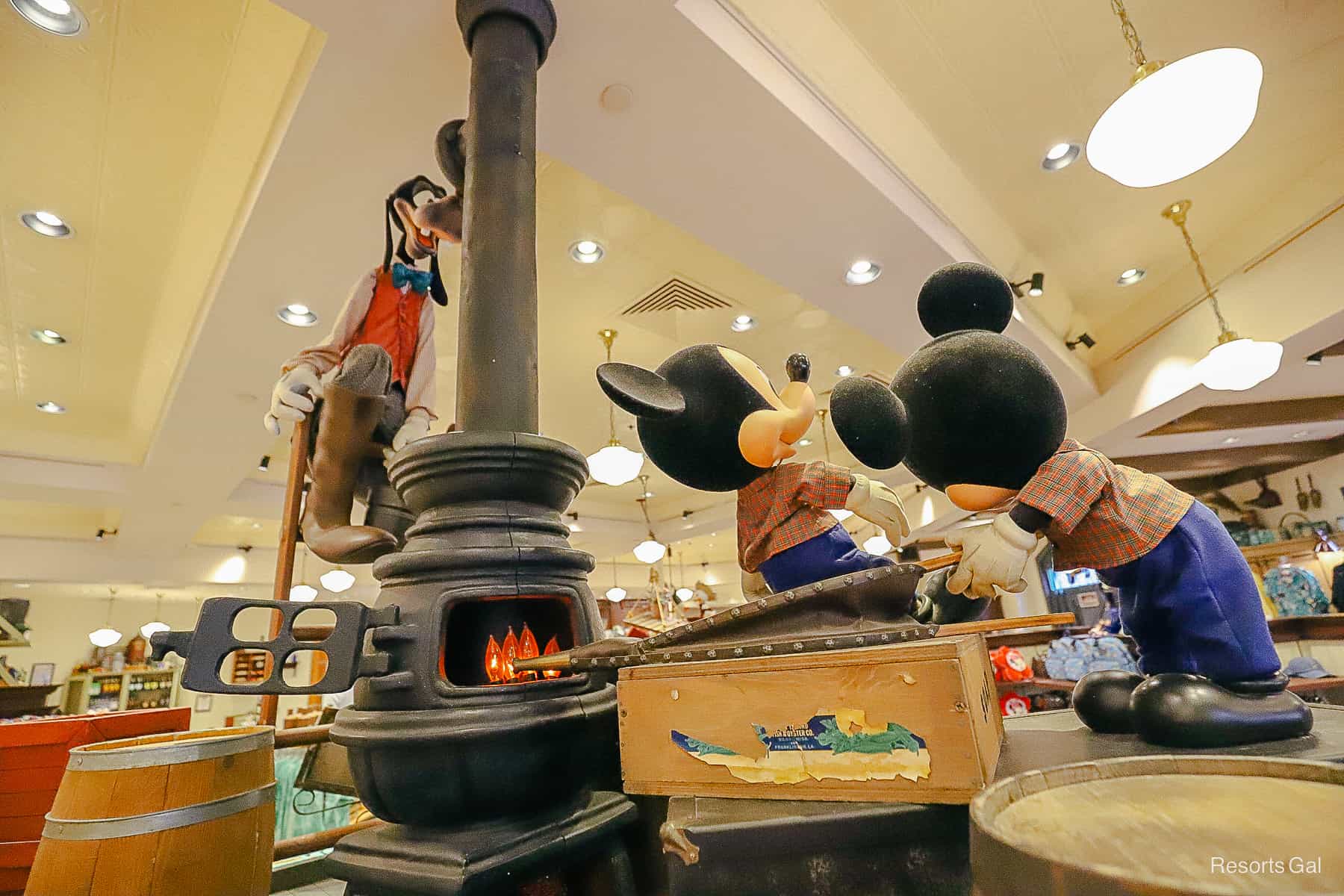 Mickey's little ones blowing air into the fire 