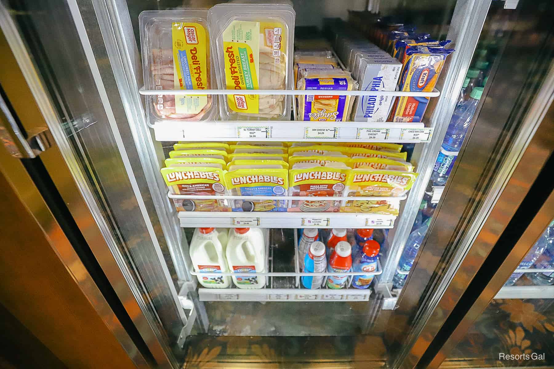 refrigerated items like Lunchables, cheese, cream cheese, and milk in Riverside's gift shop 
