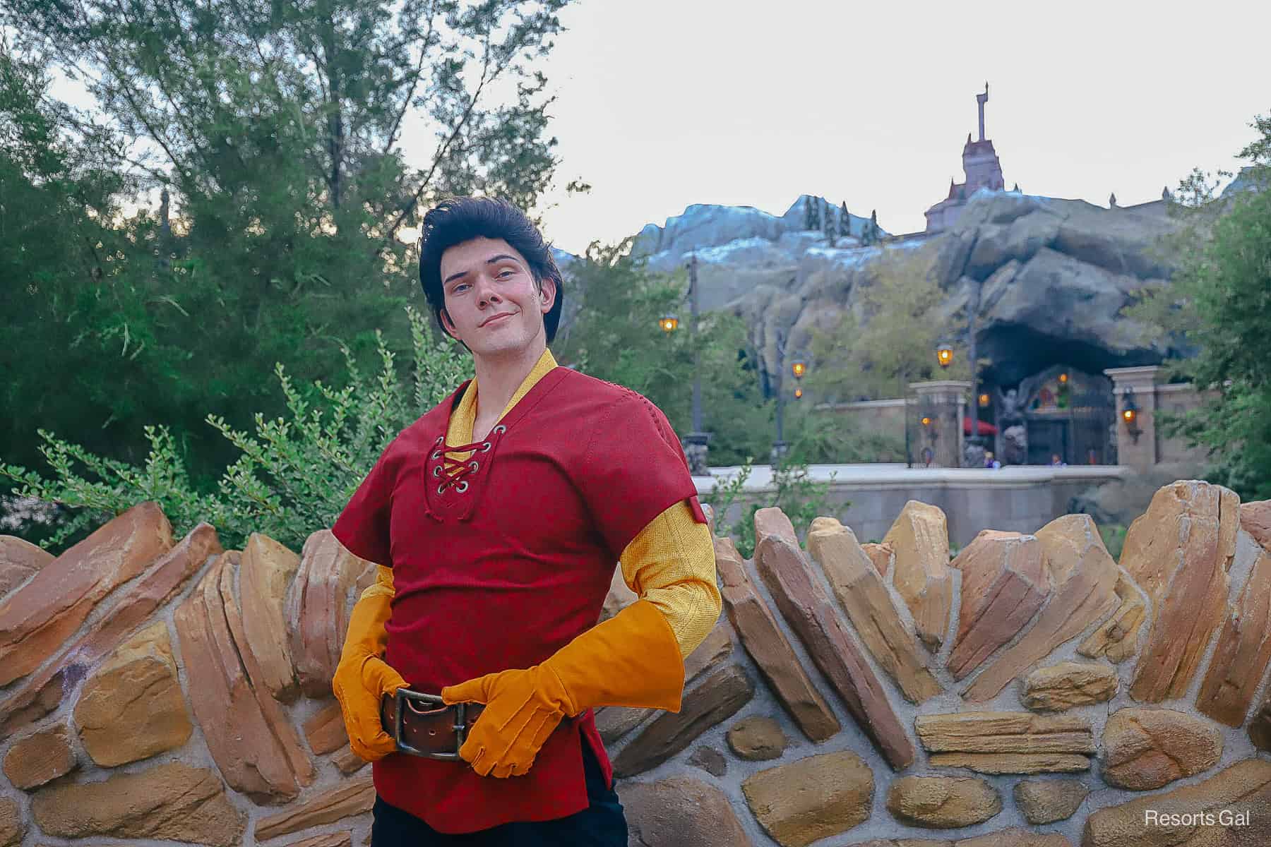 Gaston poses with hands on his belt during Mickey's Halloween Party.