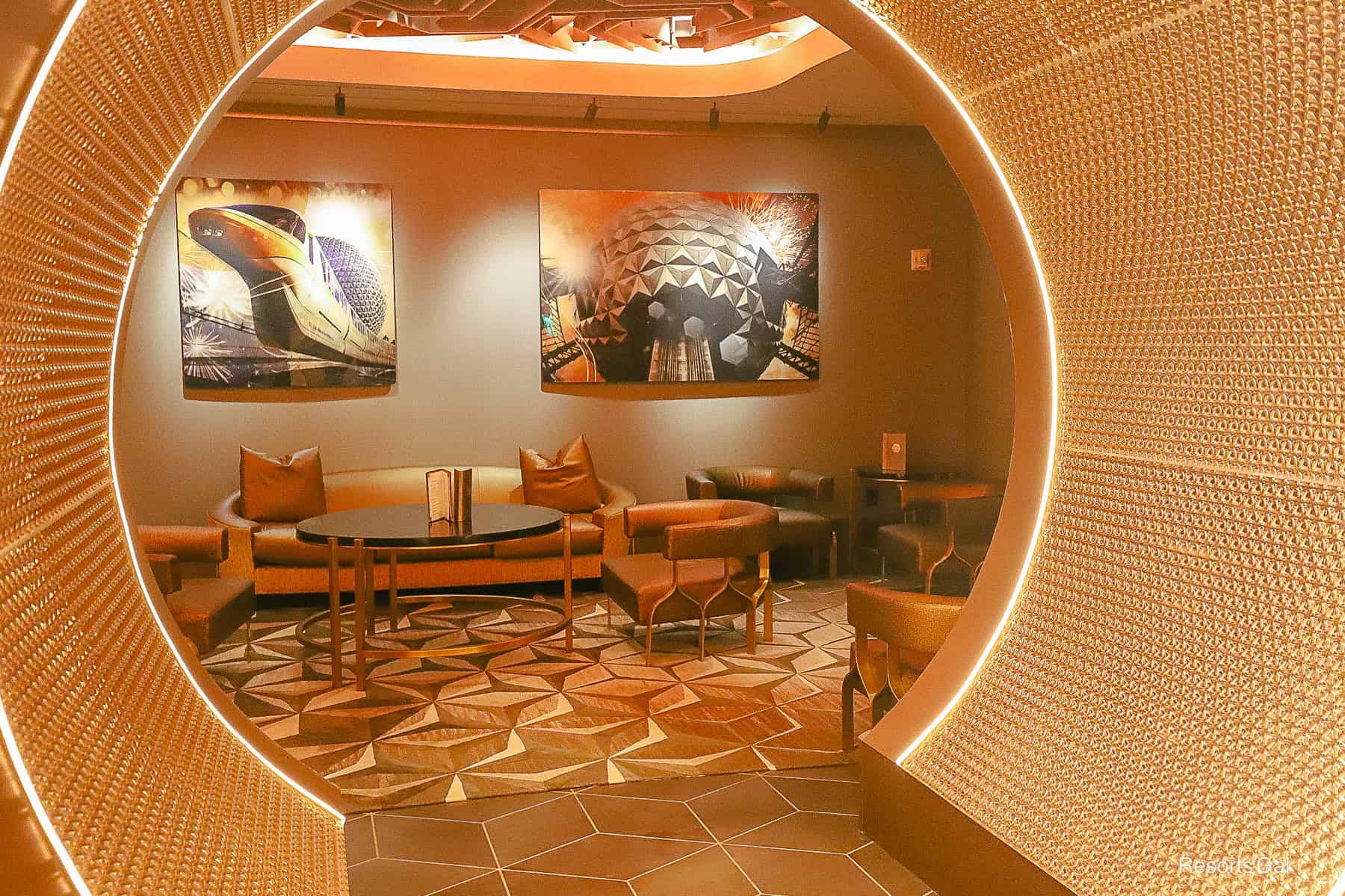 an image that shows multiple patterns of Spaceship Earth on the walls, carpet, and tile