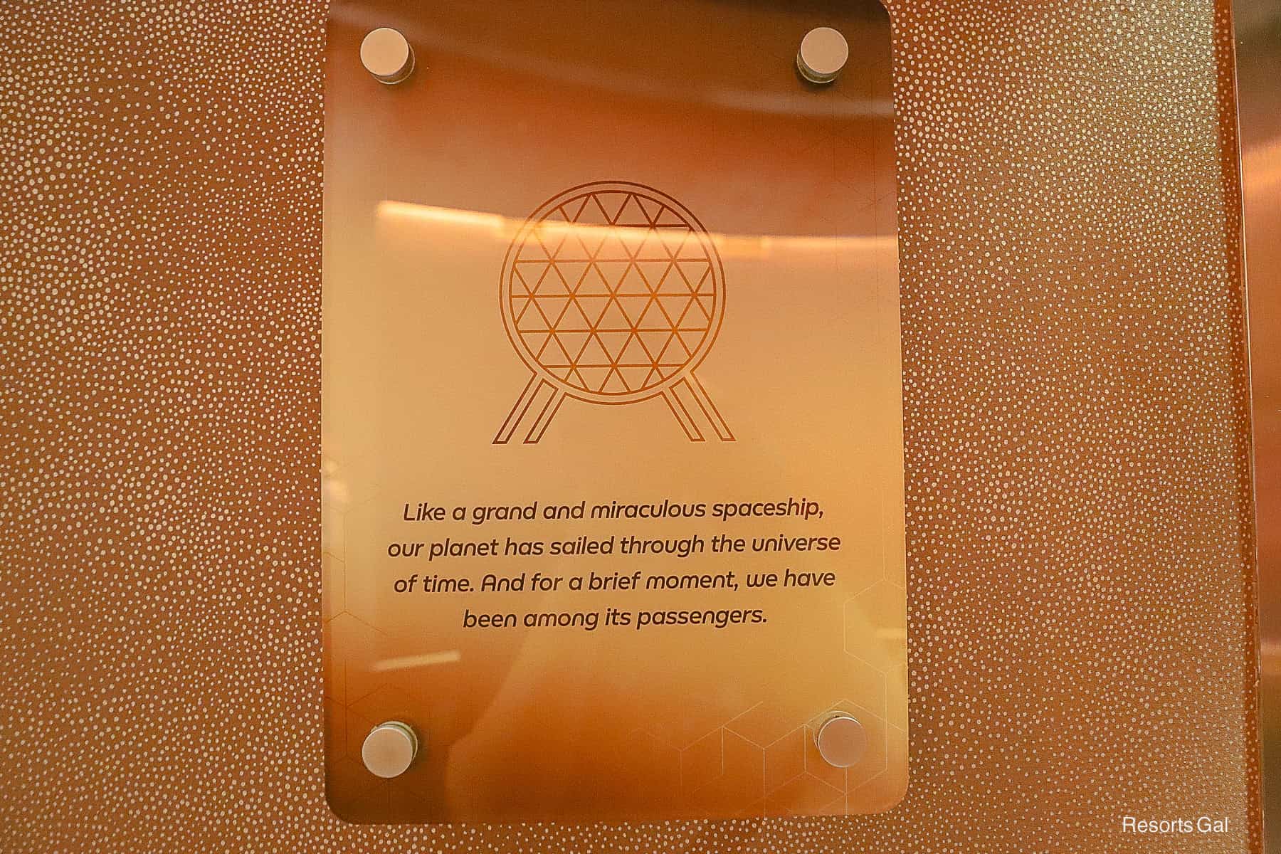 a plaque representing Spaceship Earth at GEO-82 