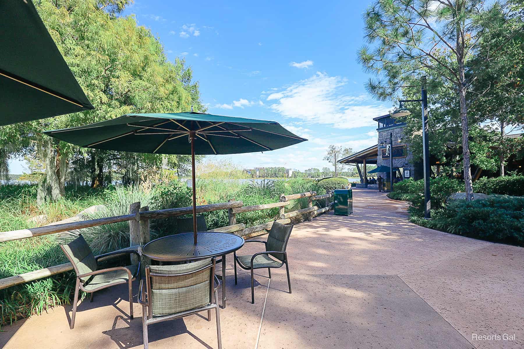 a picnic table near the entrance of Geyser Point Bar and Grill 