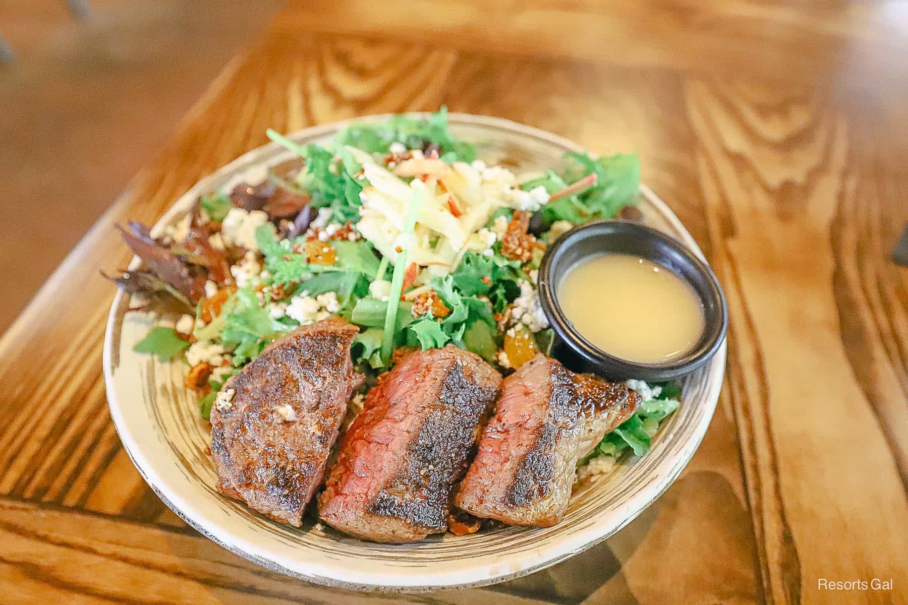 sirloin steak slices on the edge of the plate 