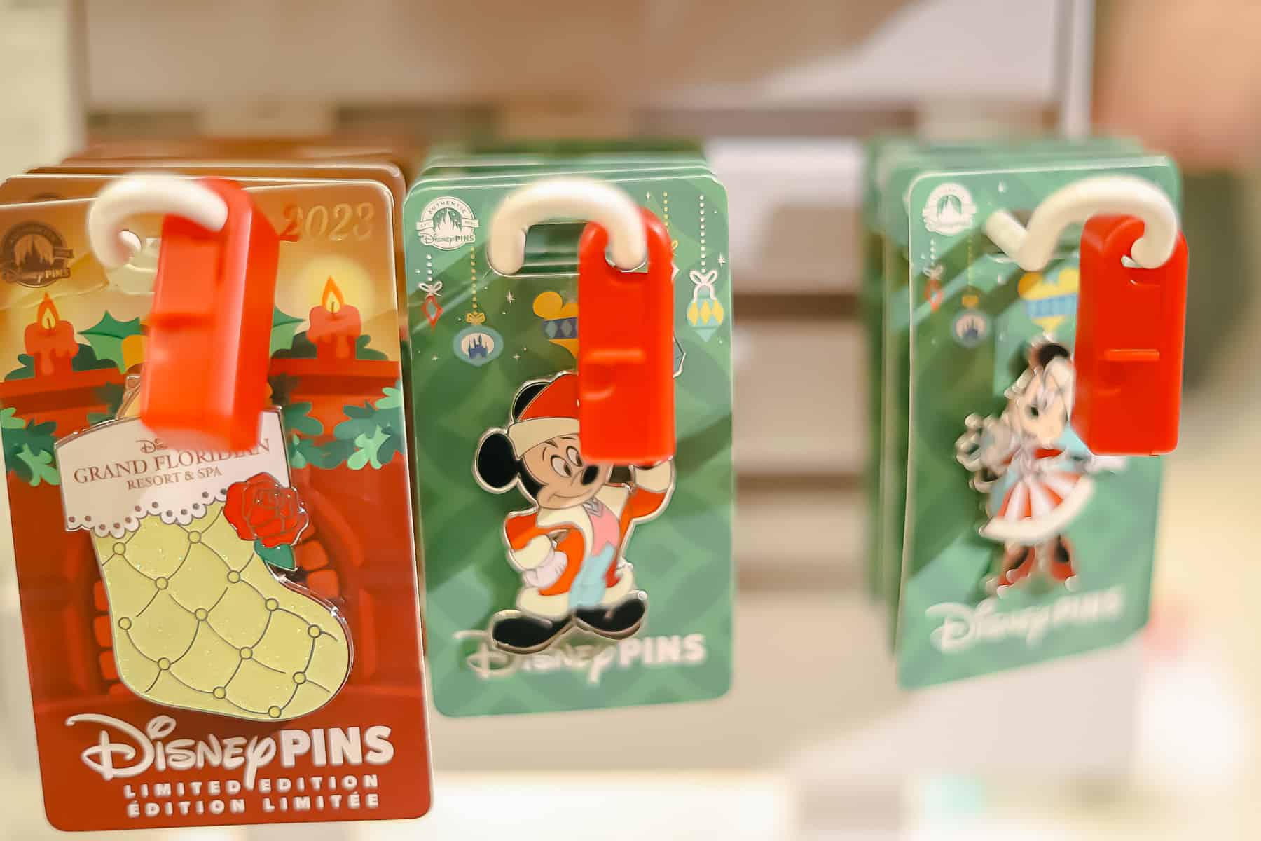 Grand Floridian collectible pins with Mickey, Minnie, and Beauty and the Beast 