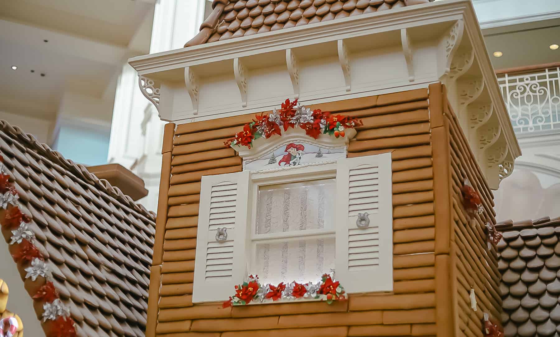 Ariel airbrushed on the top floor window of the Grand Floridian gingerbread house. 