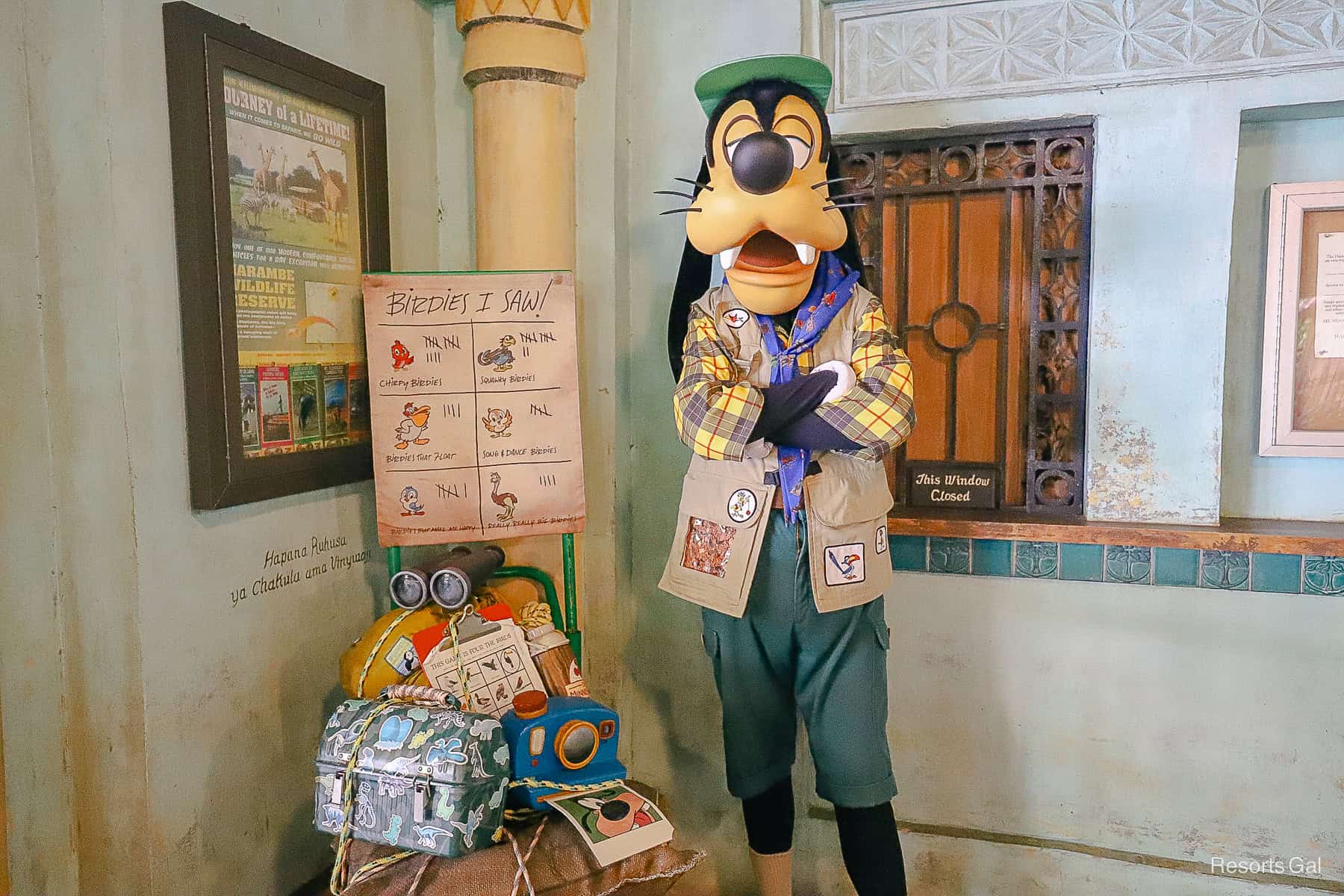 Goofy poses with arms crossed