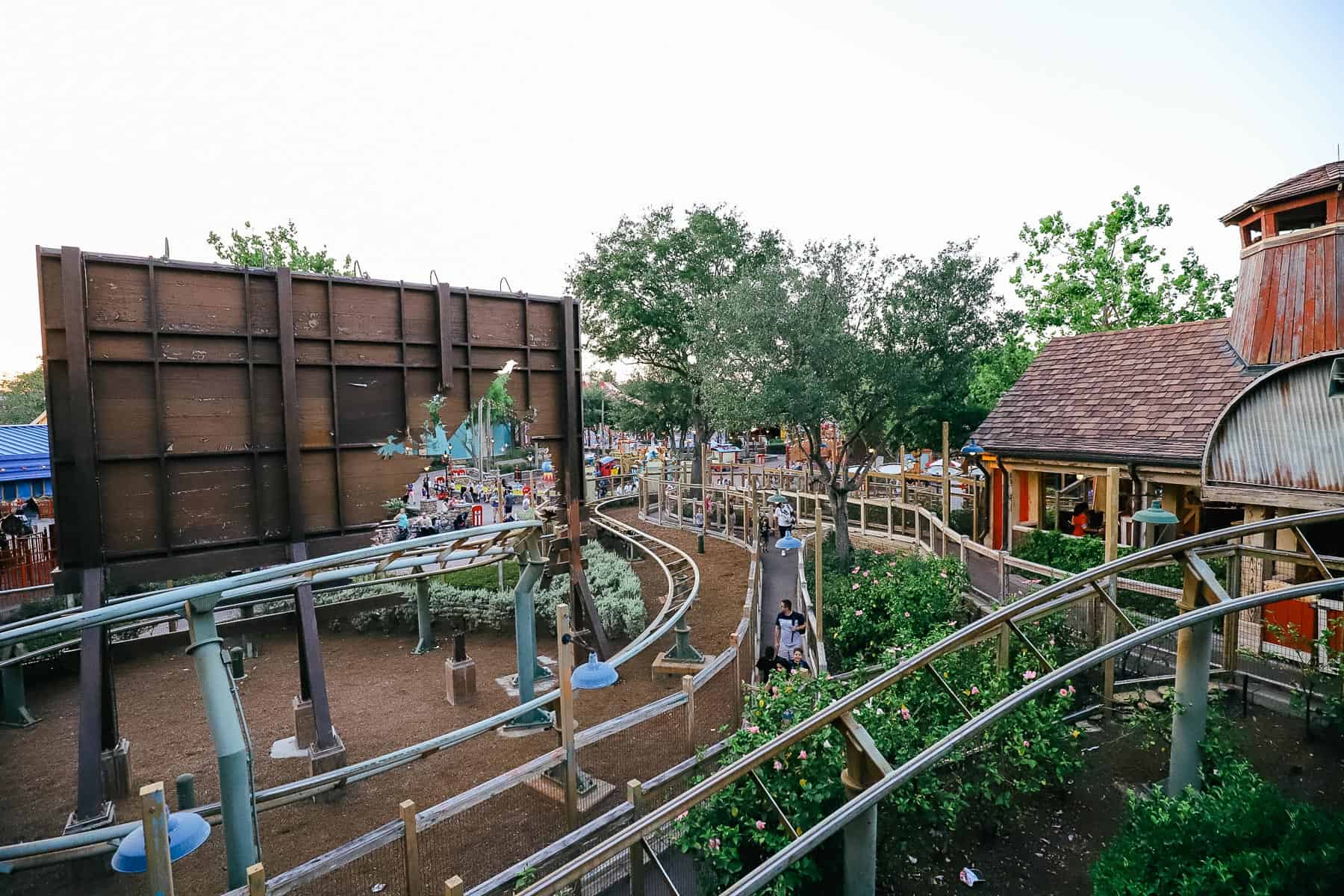 Looking down to the see roller coaster tracks from the top of the ride. 