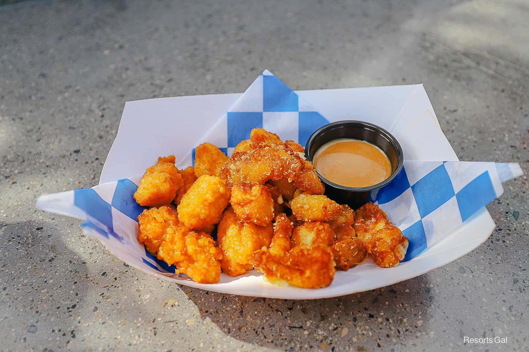 an order of Chicken Goofs with cheese curds 