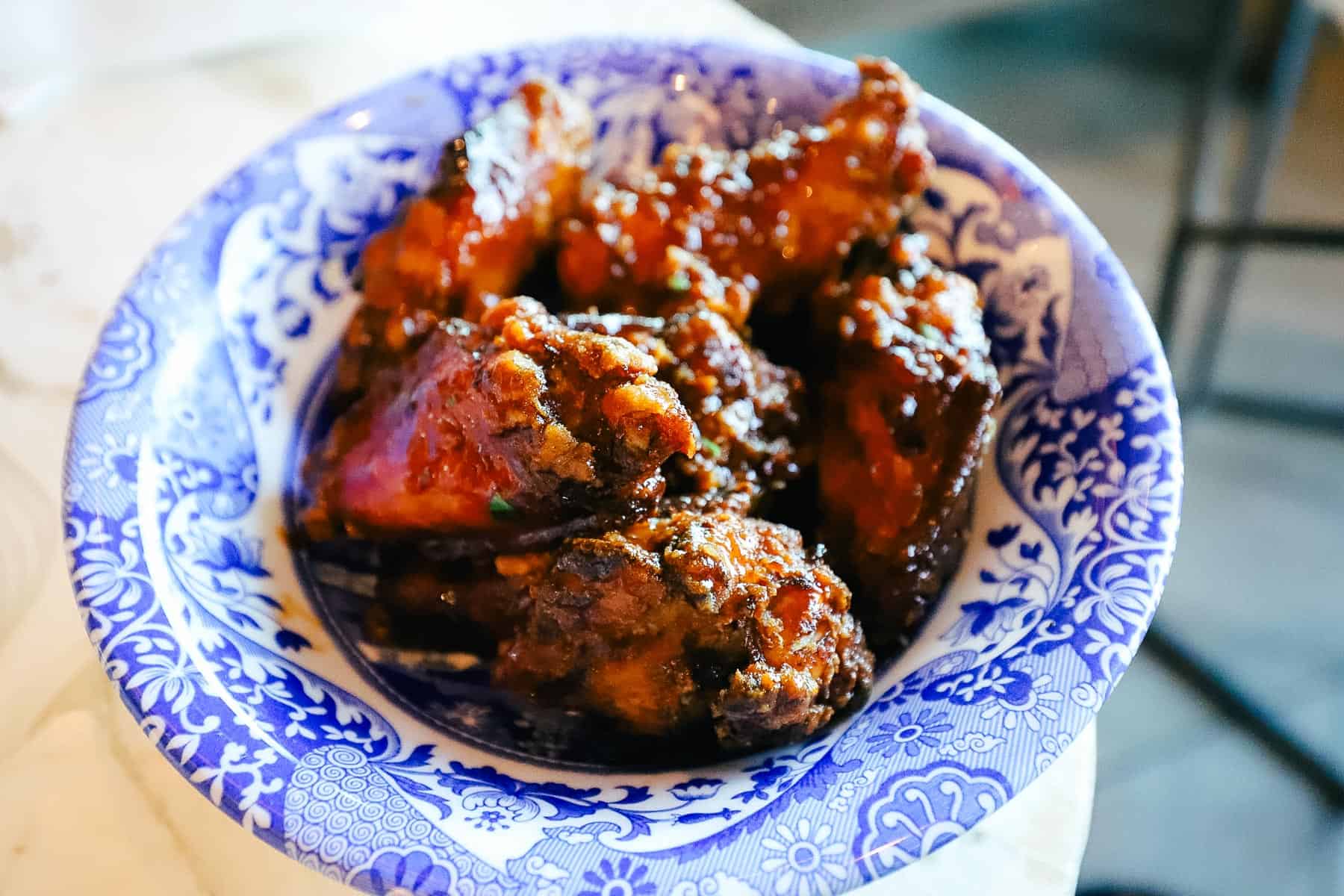 a plate of chicken wings from Dahlia Lounge 