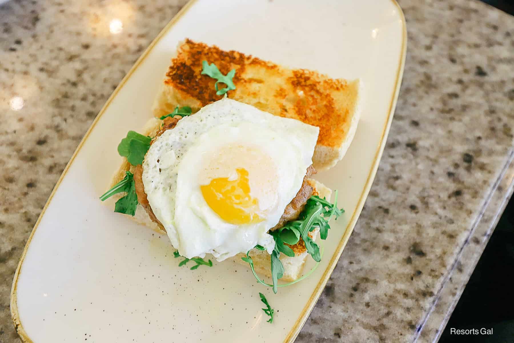 a closeup of the breakfast sandwich at Grand Floridian Cafe brunch