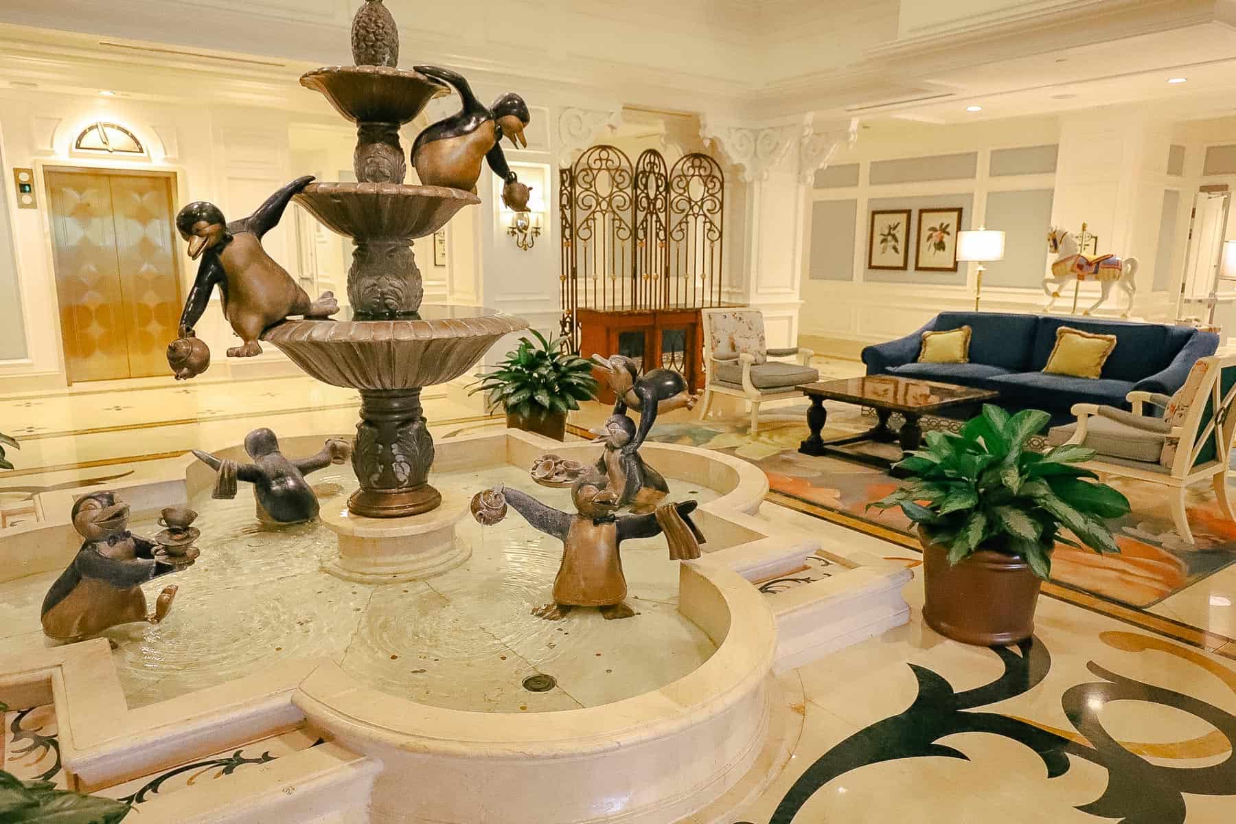 fountain with penguins from Mary Poppins in a deluxe resort hotel 