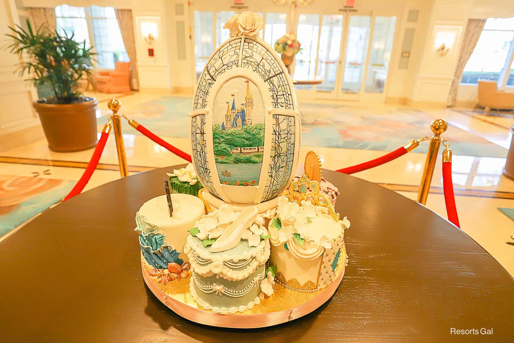 the backside of the egg features a nod to the wedding chapel at the Grand Floridian looking to Magic Kingdom