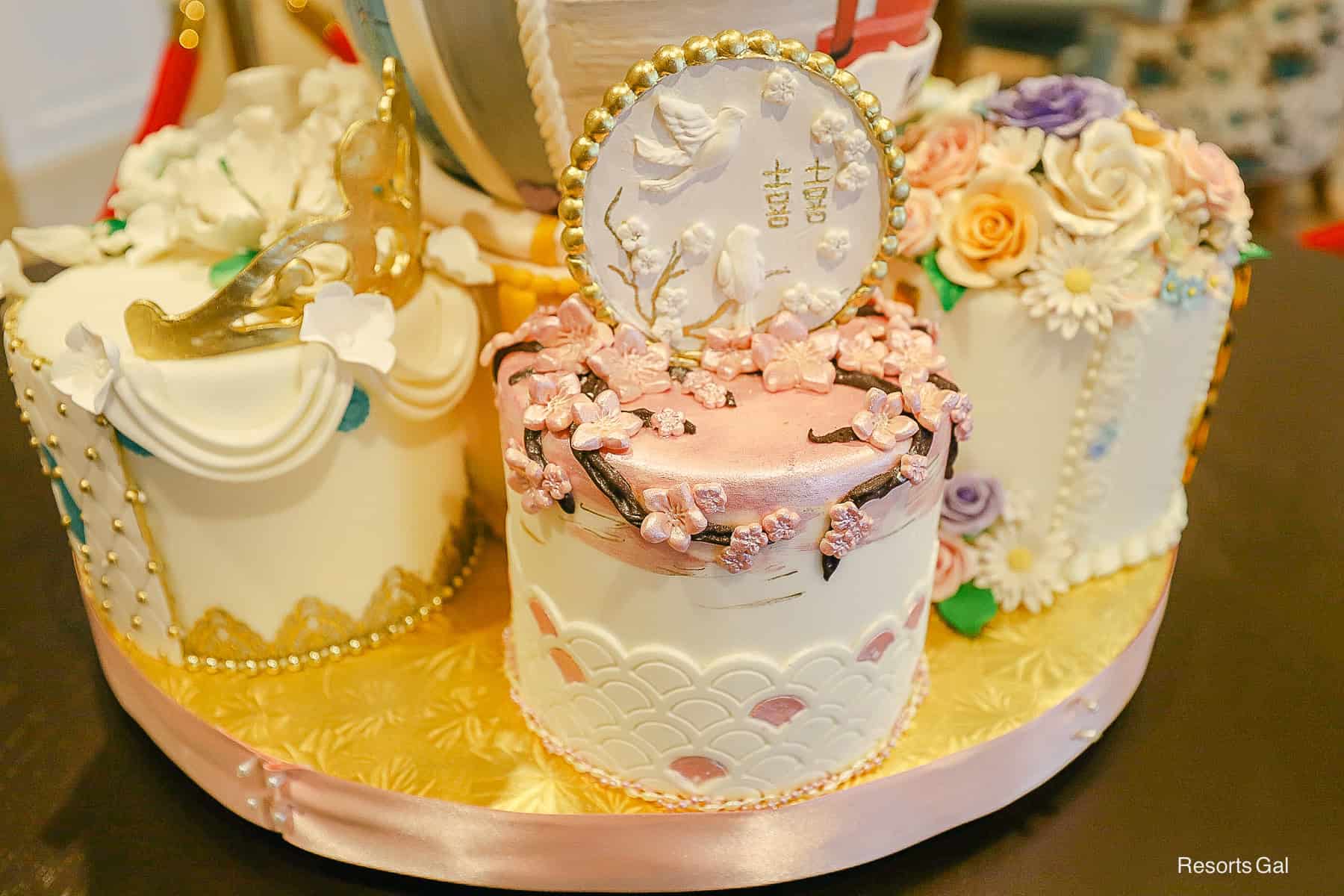 a Mulan themed cake at the base of the princess egg