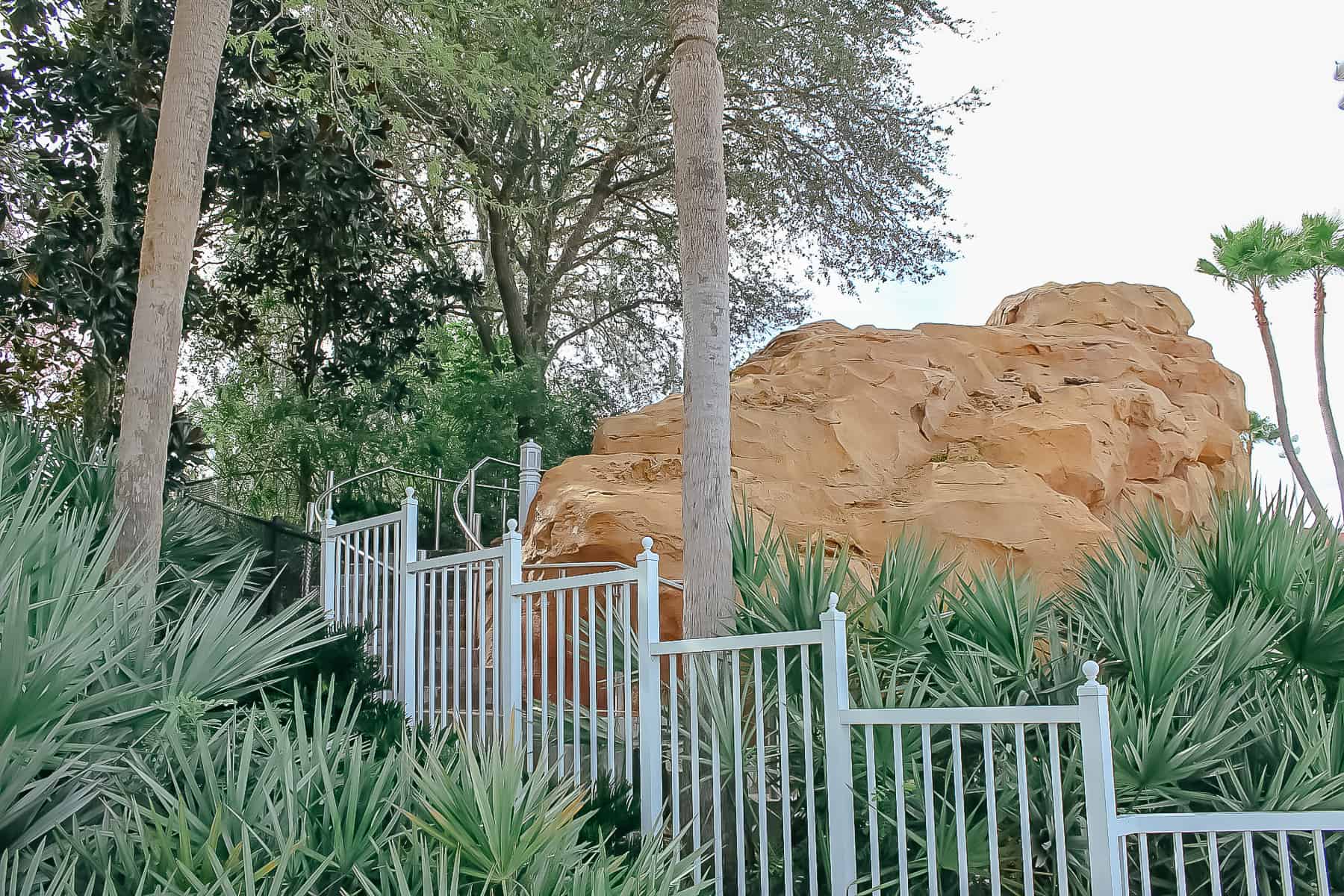 a staircase leading up to the slide at the Beach Pool 