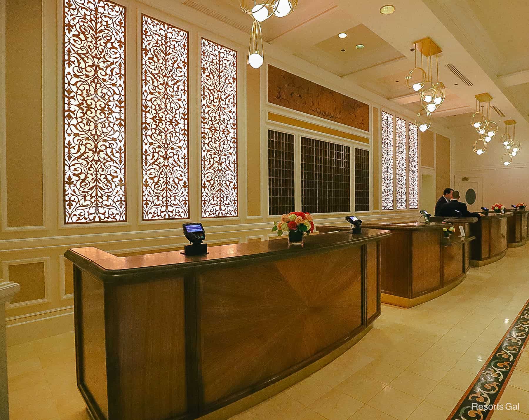 the row of check-in areas as seen from an angle at the Grand Floridian