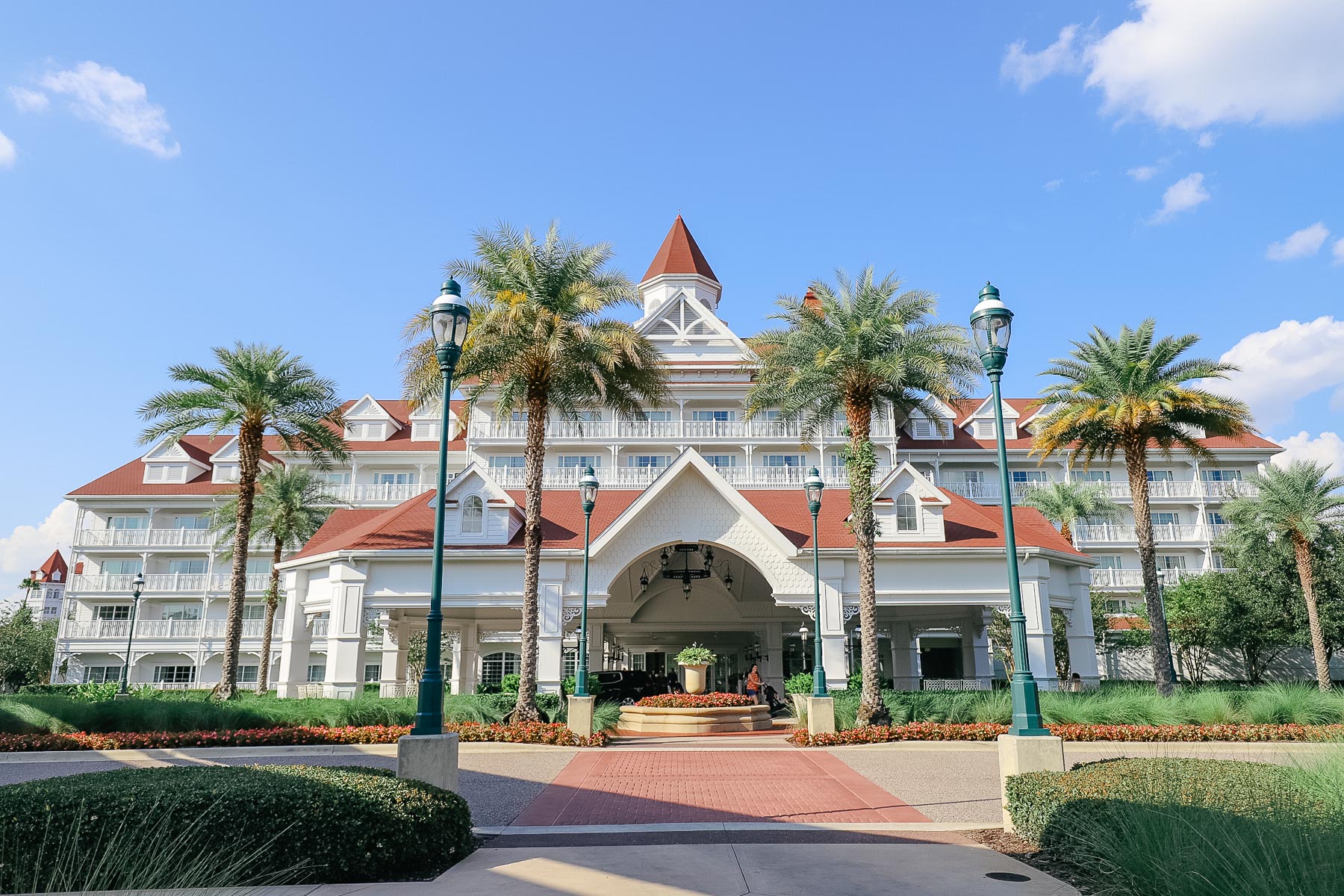 Disney's Grand Floridian Villas Building with red roof and palm trees 