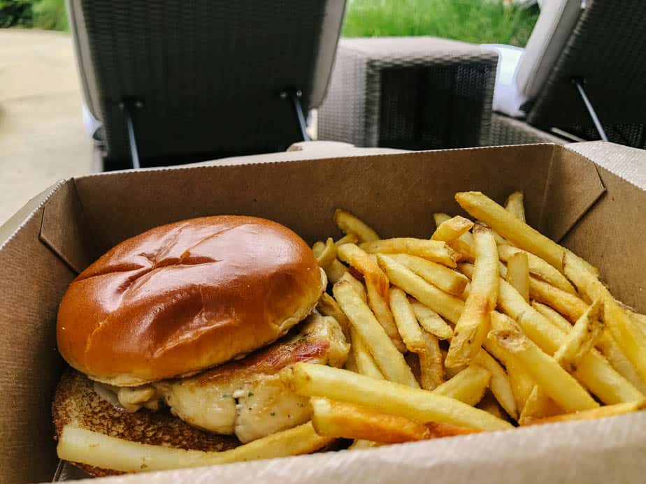 a grilled chicken sandwich and fries 