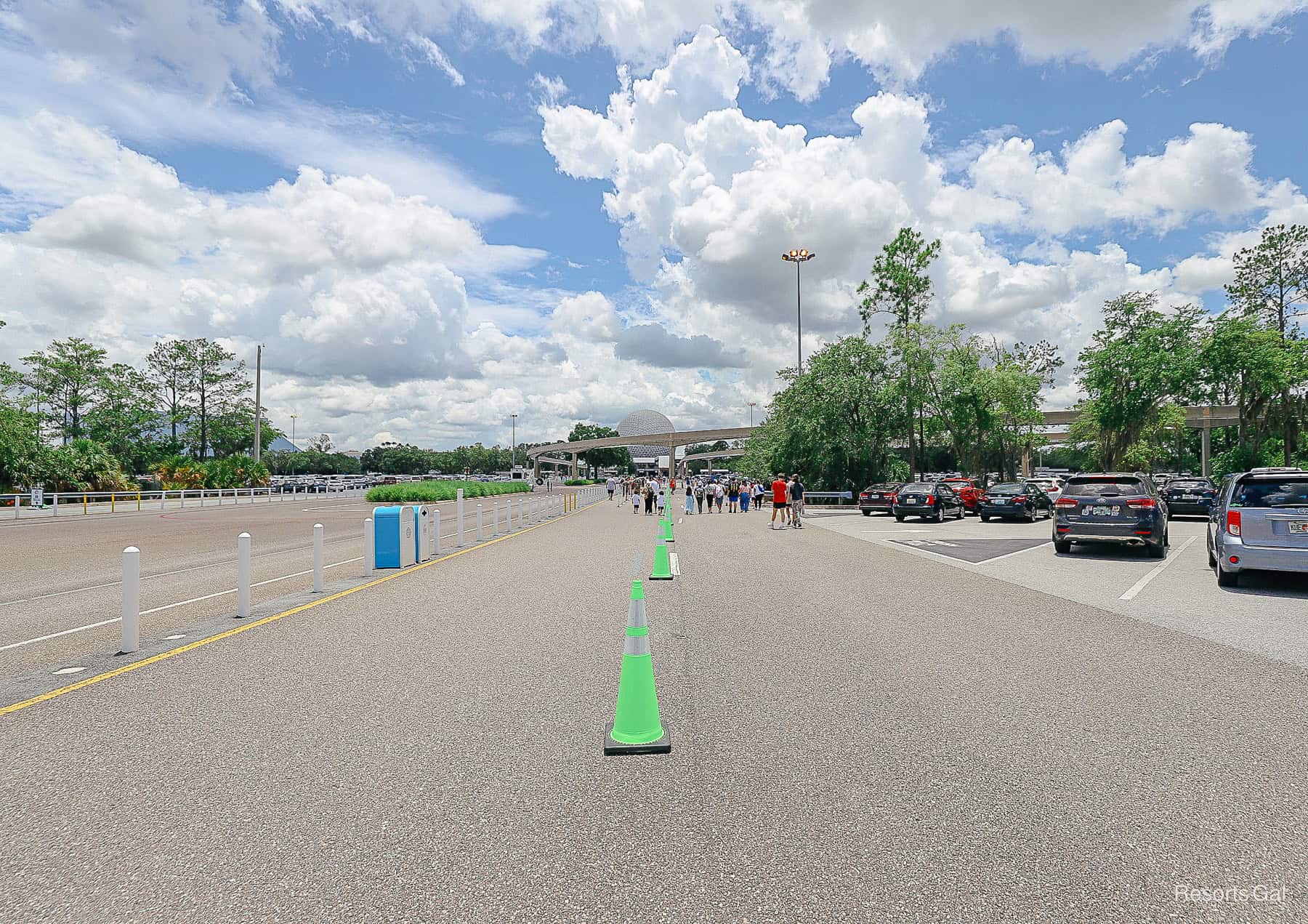 guests walking to their cars in the parking lot at Epcot 