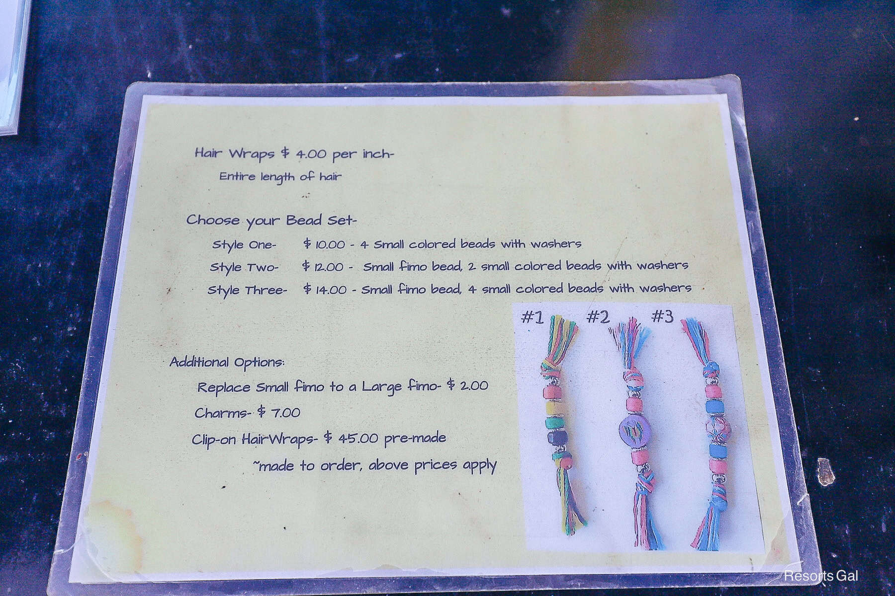 a sheet with a list of hair wraps and add-ons