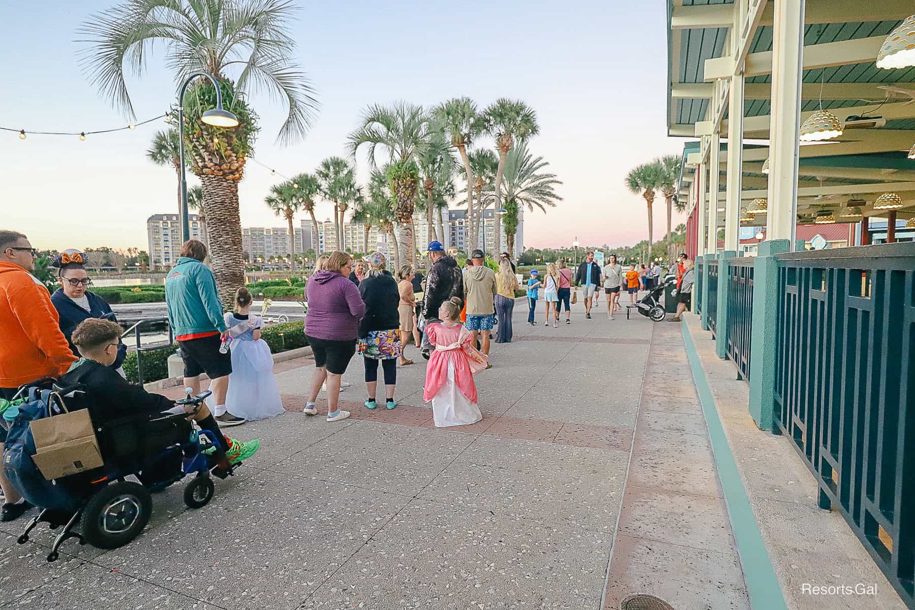 guests waiting in line to trick or treat at Disney's Caribbean Beach Resort Hotel