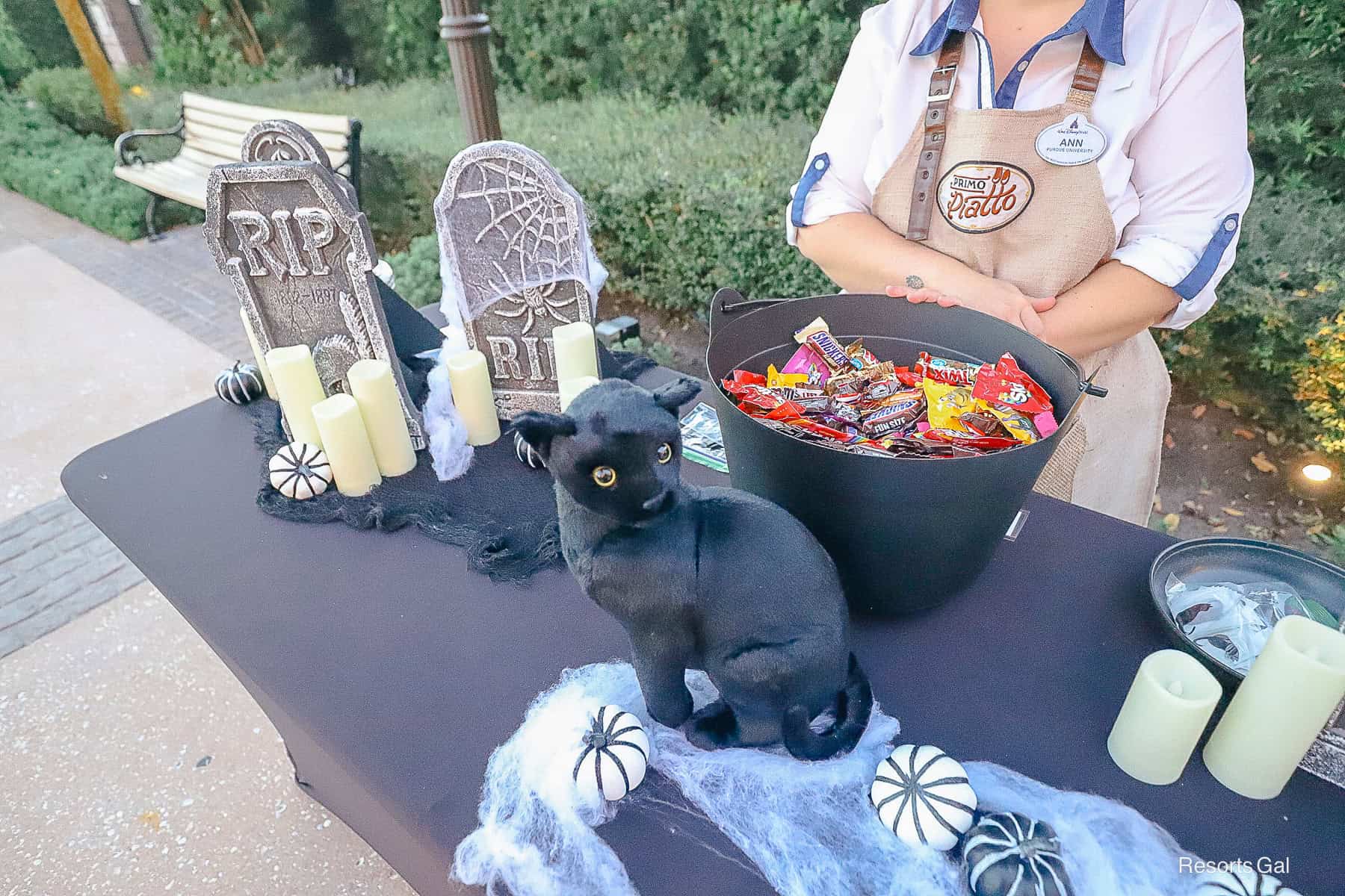 a booth where guests could get Halloween treats at the Disney Resorts