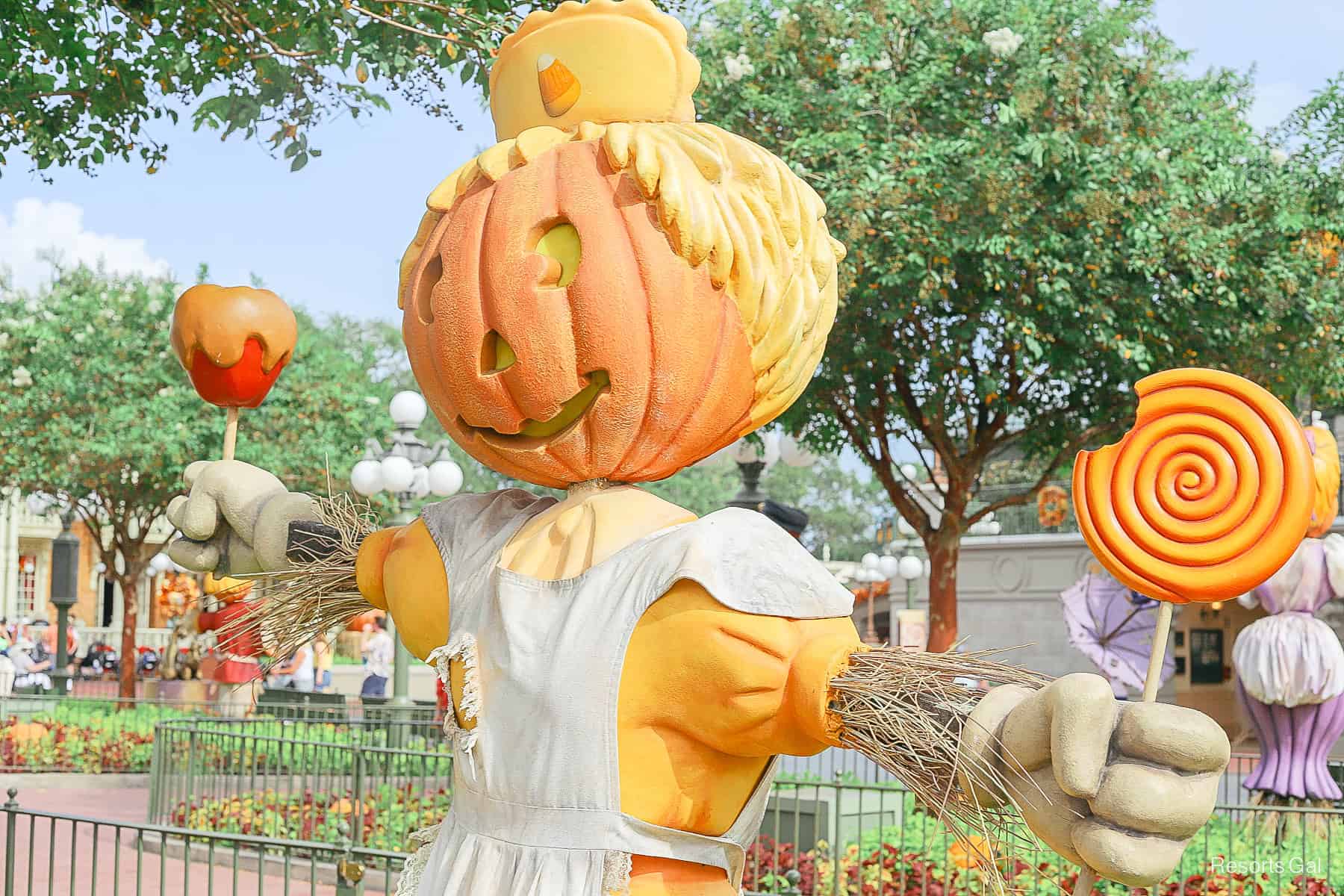 a scarecrow representing a cast member at the Confectionery during Halloween at Disney World 