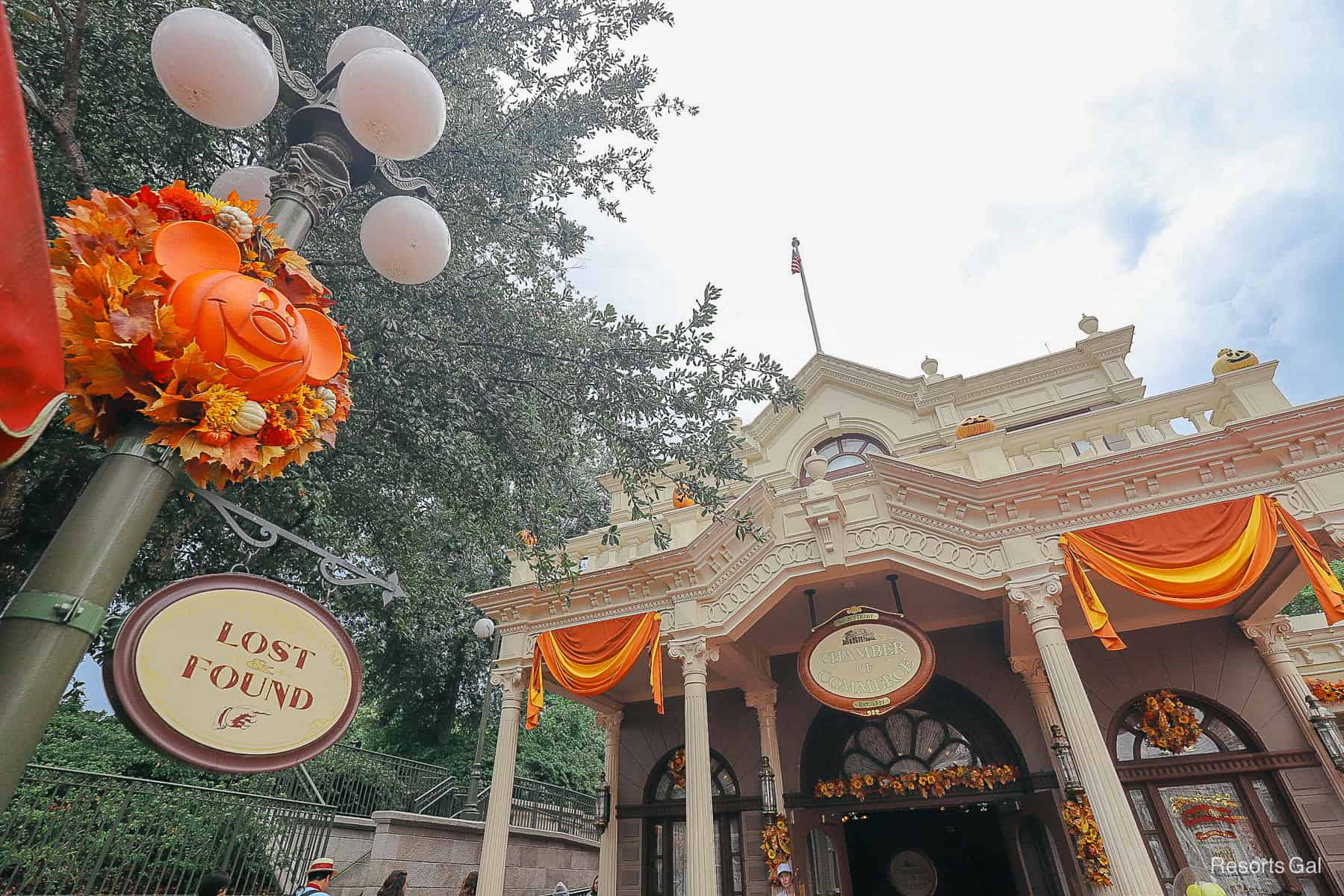 the Chamber of Commerce at Magic Kingdom with Halloween bunting and wreaths 