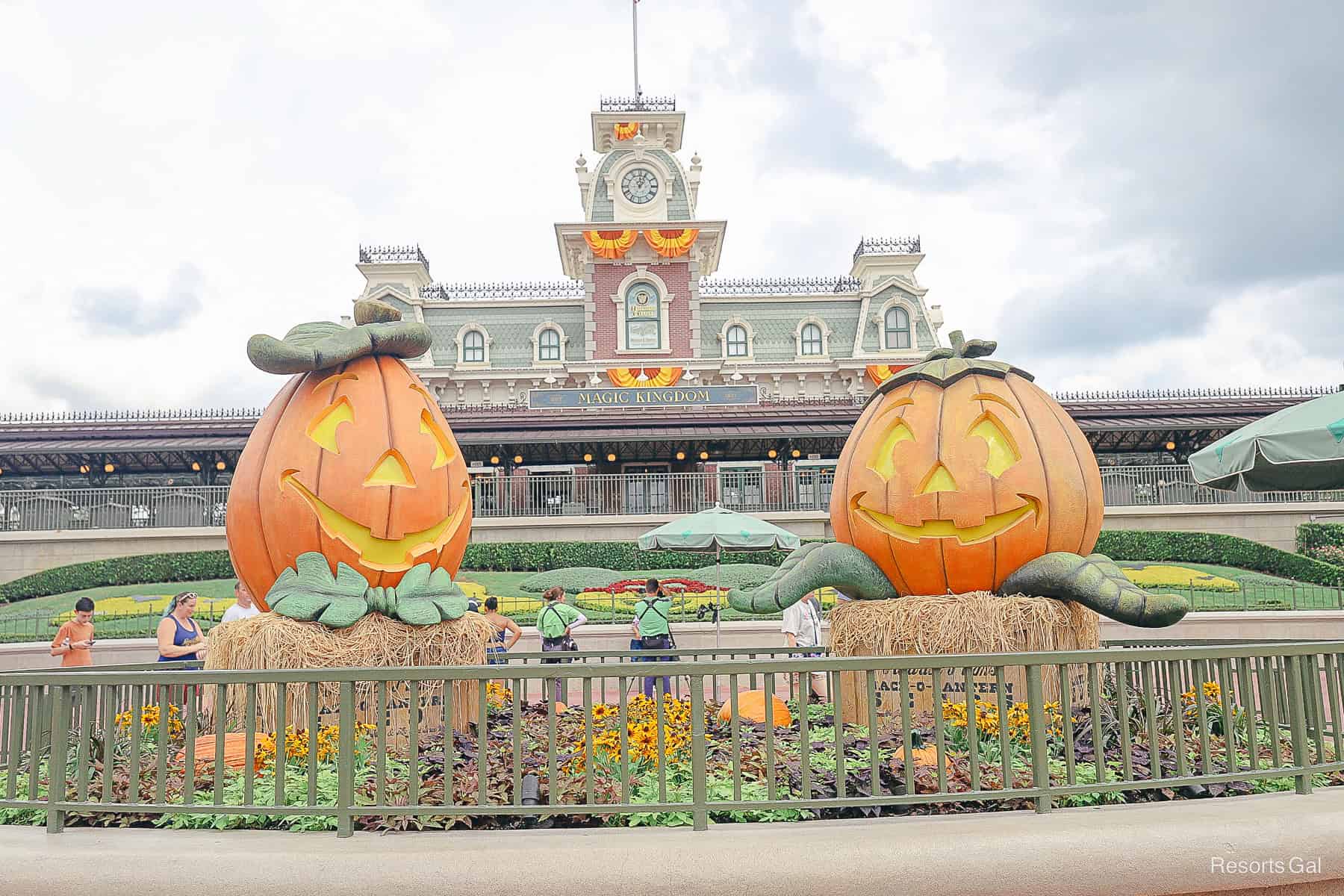 a closeup of the entrance pumpkins outside the Main Street train station 