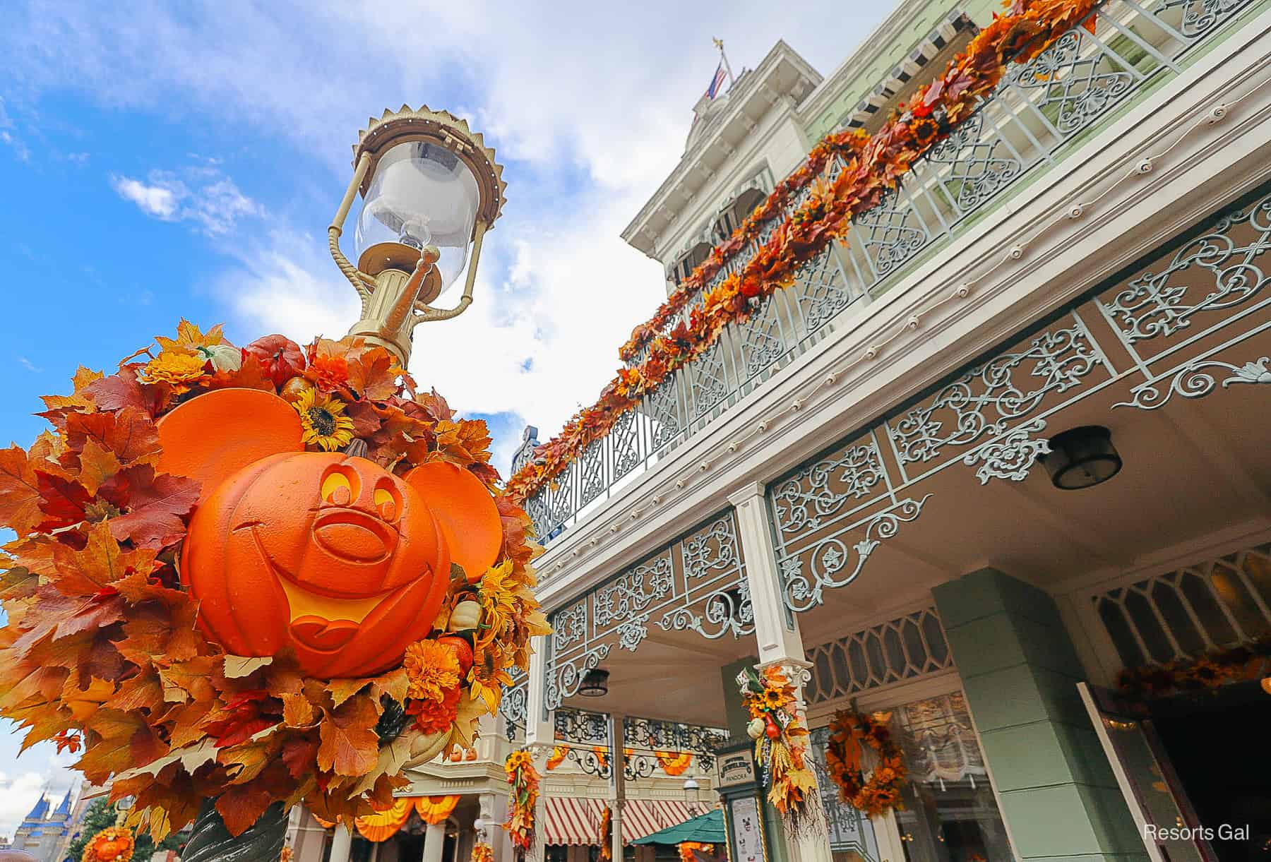 Mickey pumpkin wreath on a lamppost at Magic Kingdom Halloween 2025