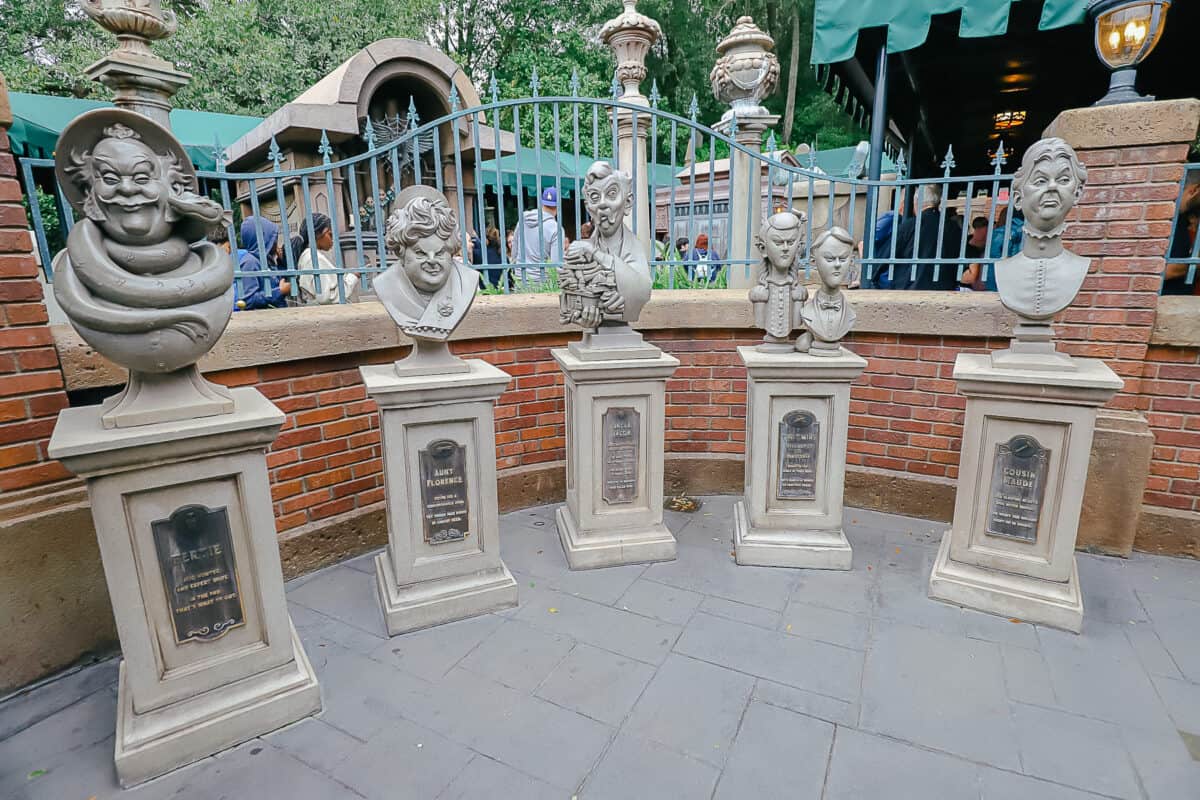 statues of former residents of the Haunted Mansion 