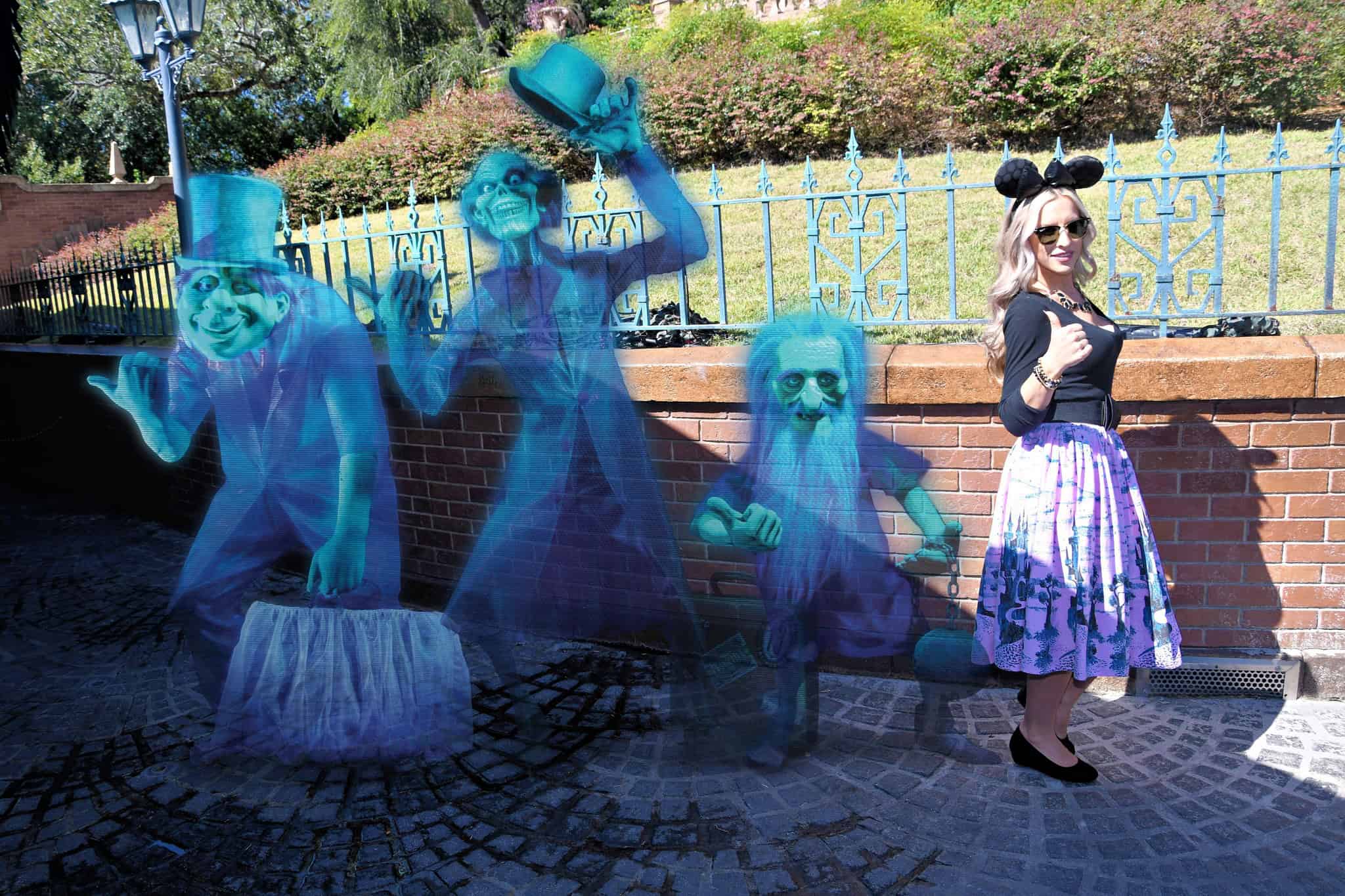 a guests taking a photo with the Hitch Hiking Ghosts 
