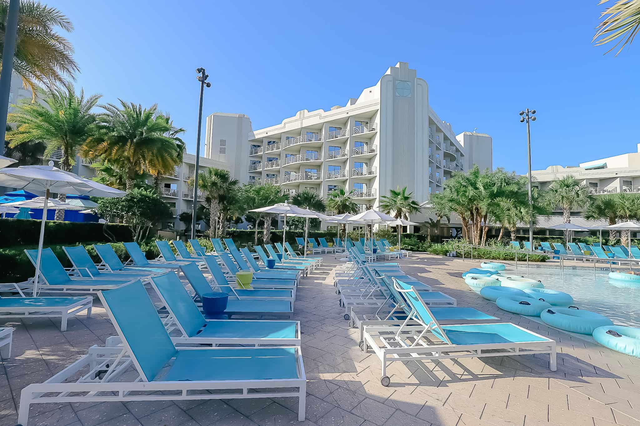 lounge chairs surrounding the pool 