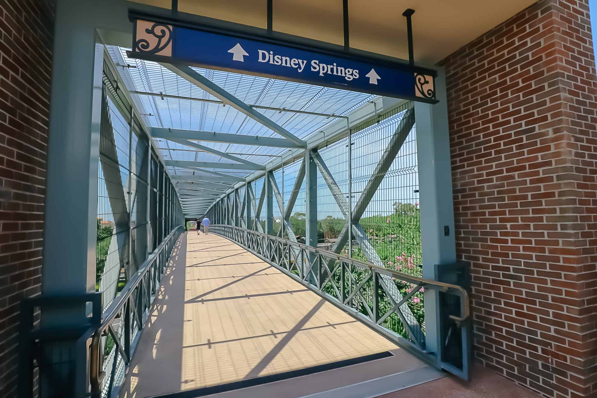 a pedestrian bridge guests can take from Buena Vista Palace to Disney Springs 