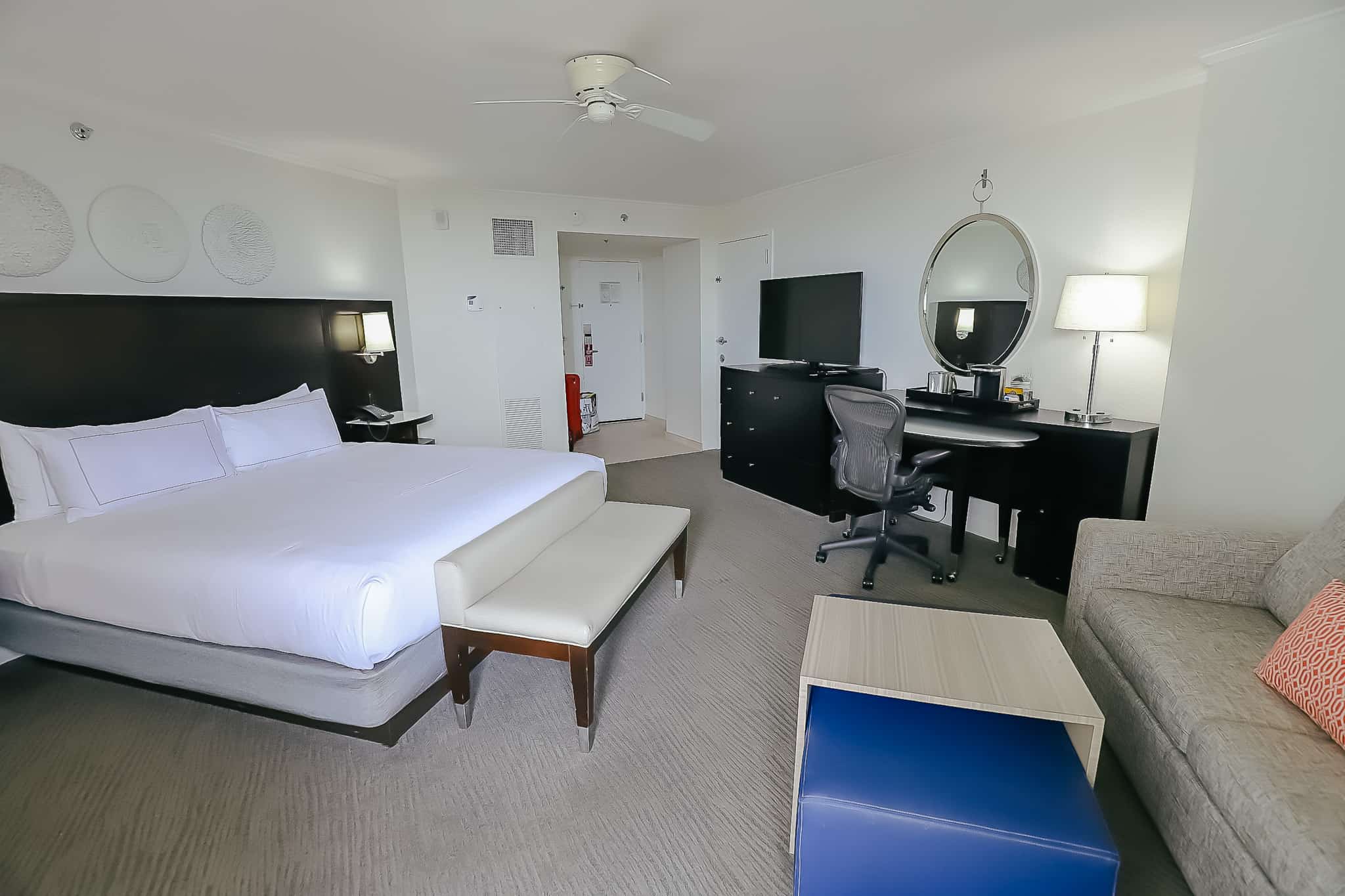 view of the room from the window shows bed, desk, and sofa Hilton Buena Vista Palace