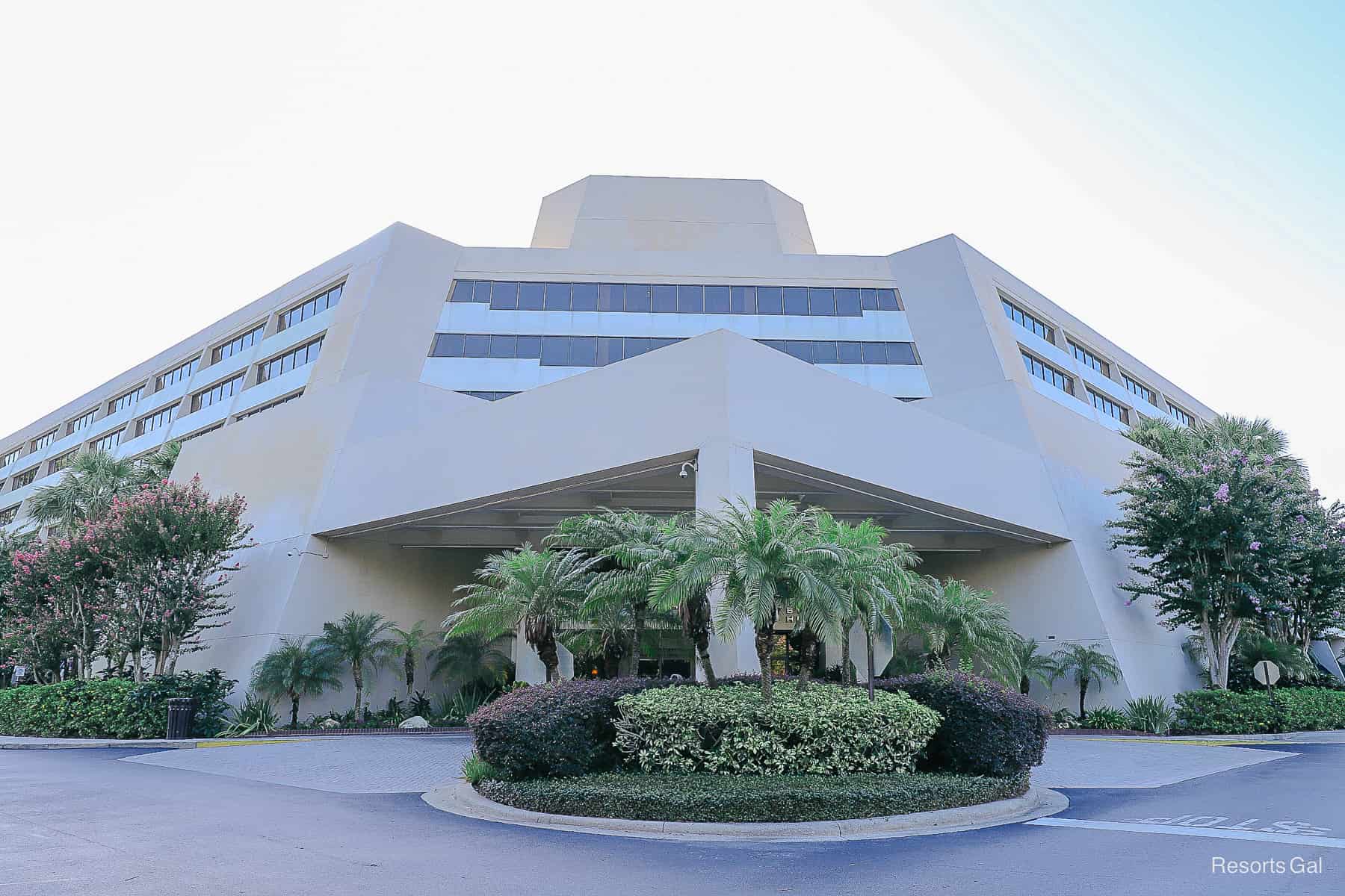 a front view of the Doubletree near Disney Springs with a group of palm trees. 