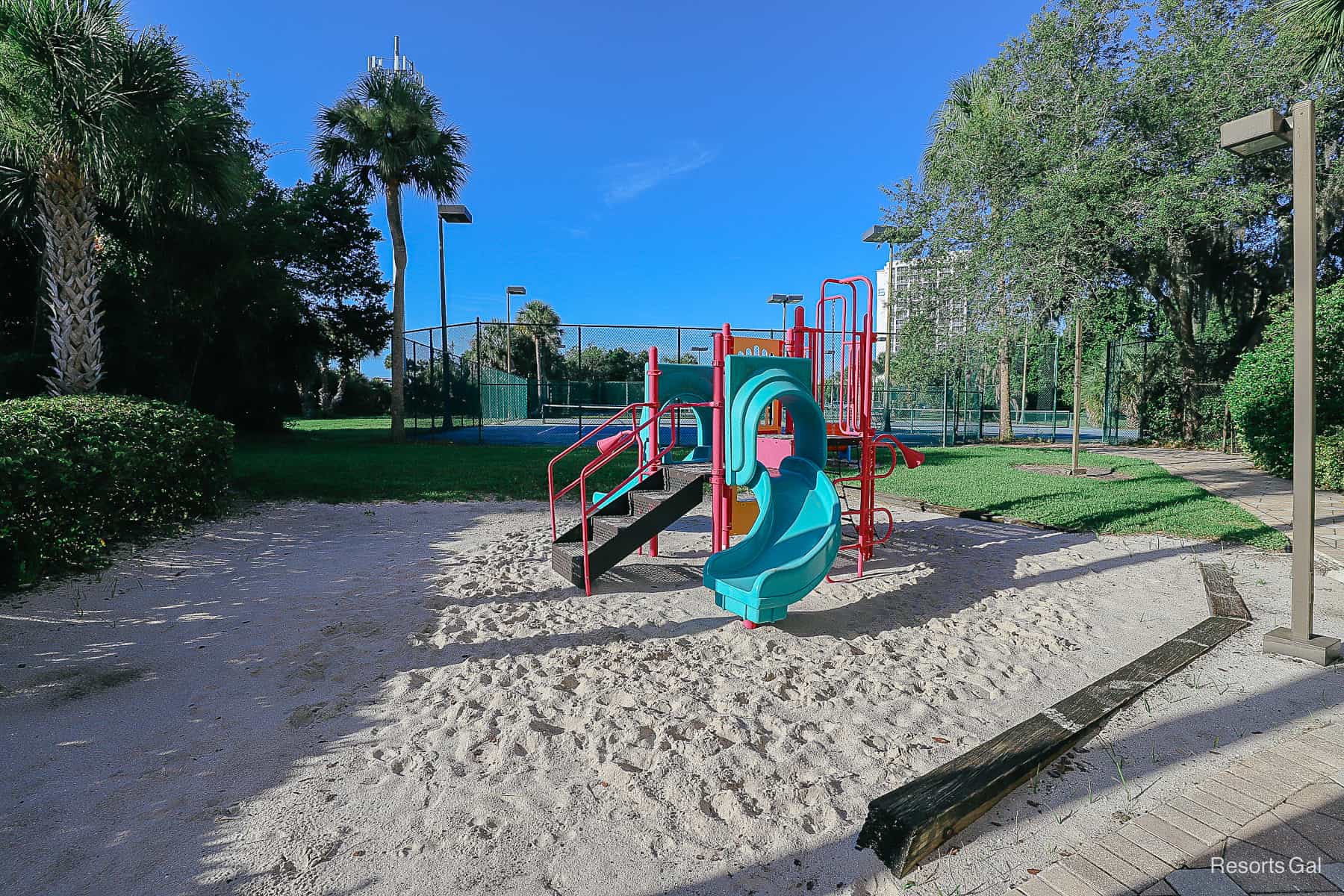 a playground in a sandy area 