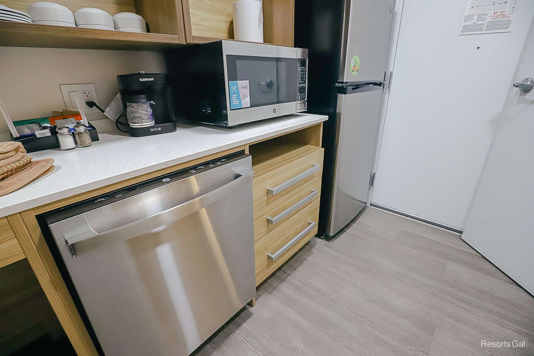 the dishwasher and full refrigerator 