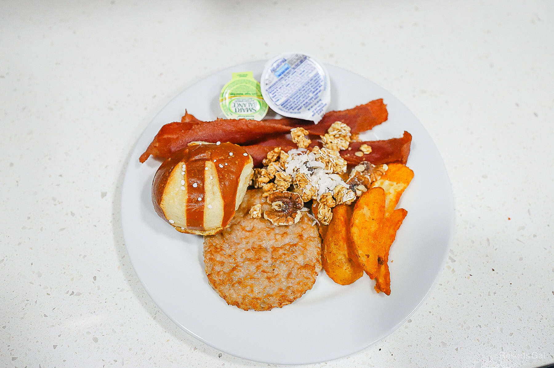 a plate with breakfast items 